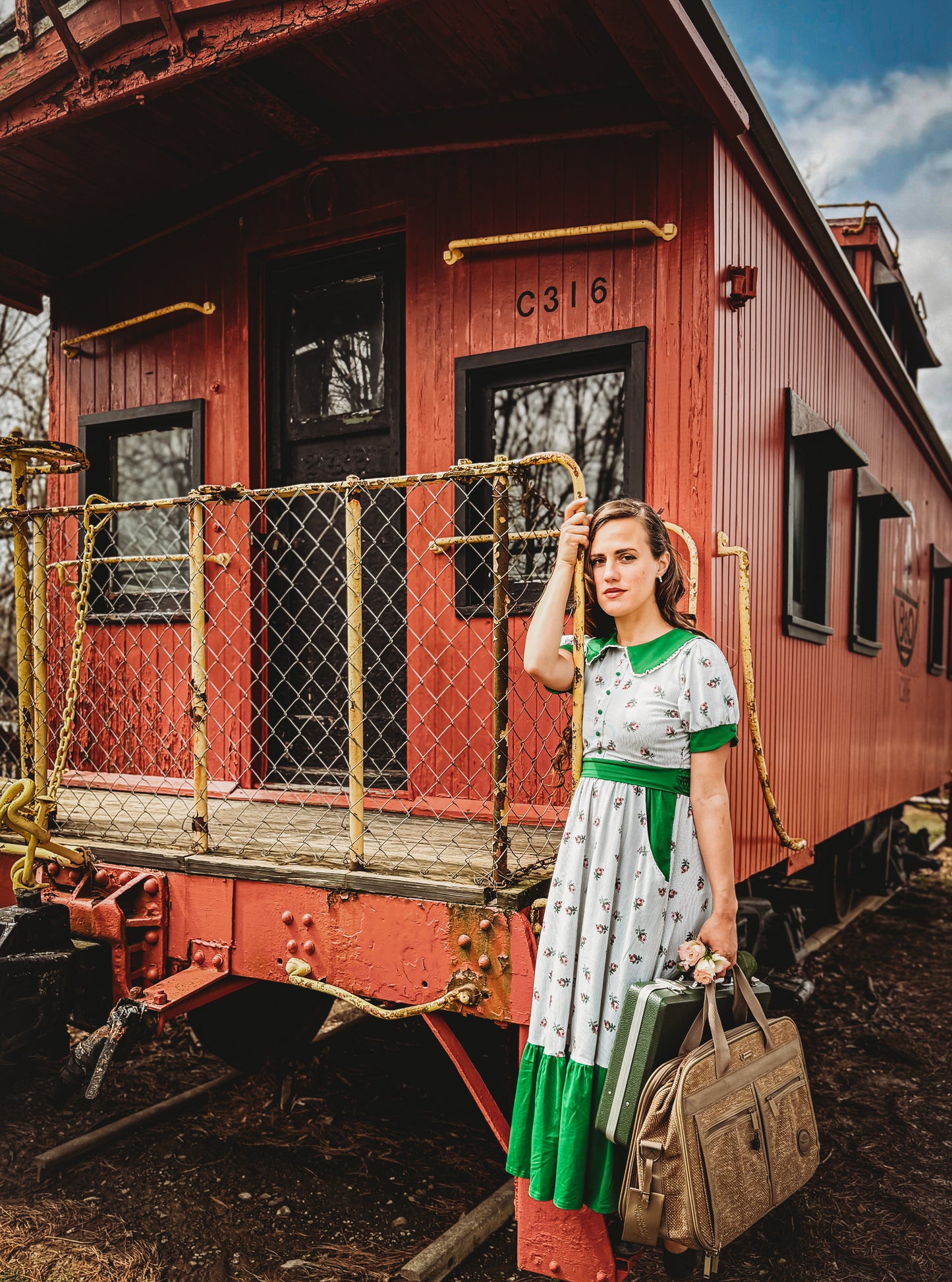 woman wearing a green and white striped modest nursing dress