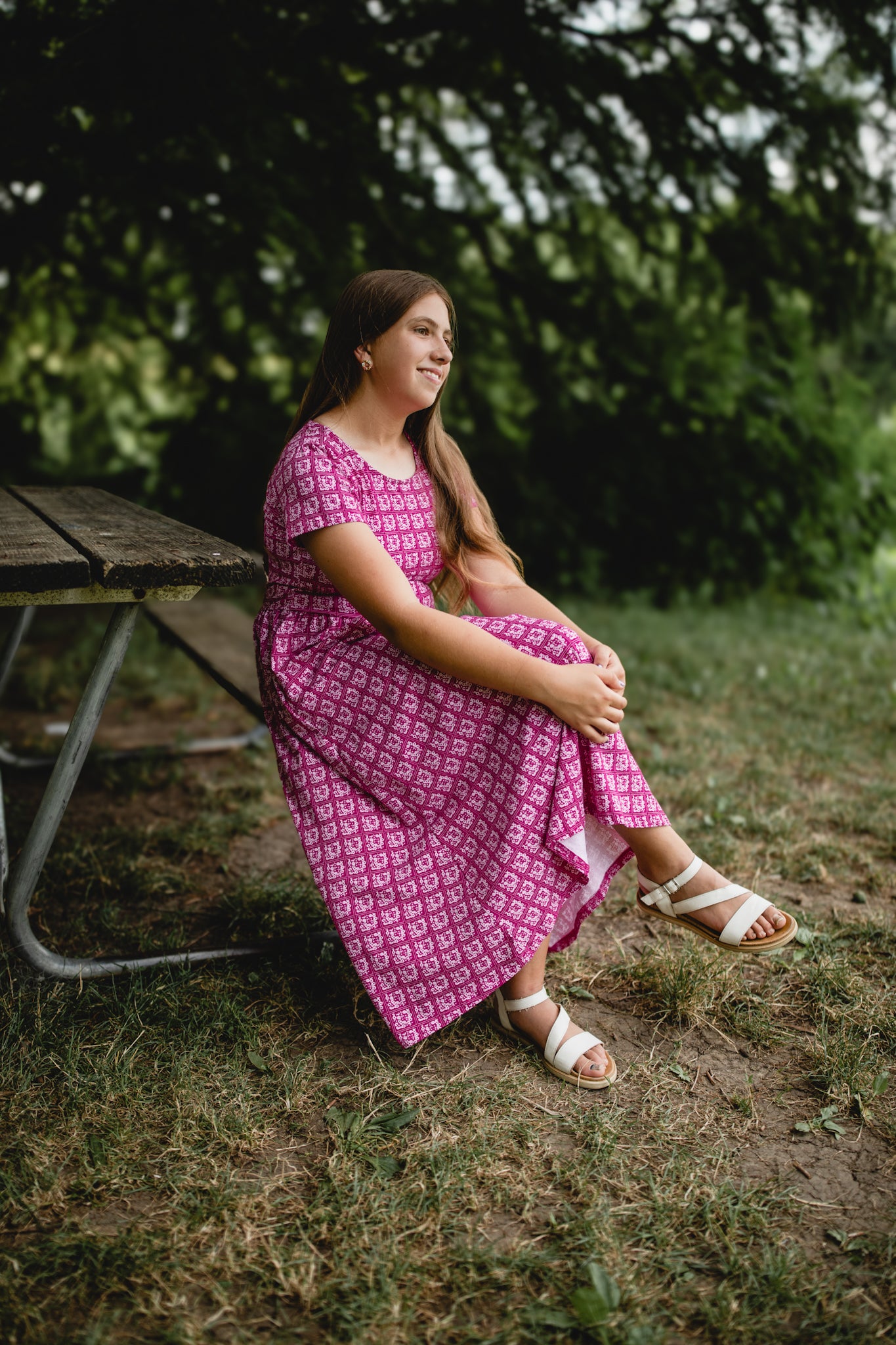 Young girl in a modest pink dress