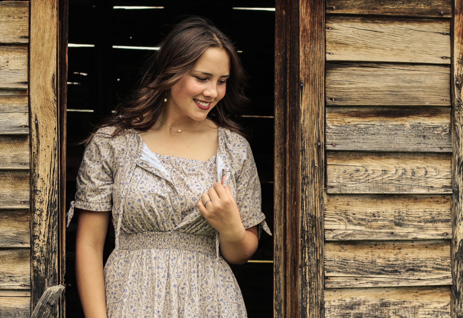 woman in patterned modest nursing dress