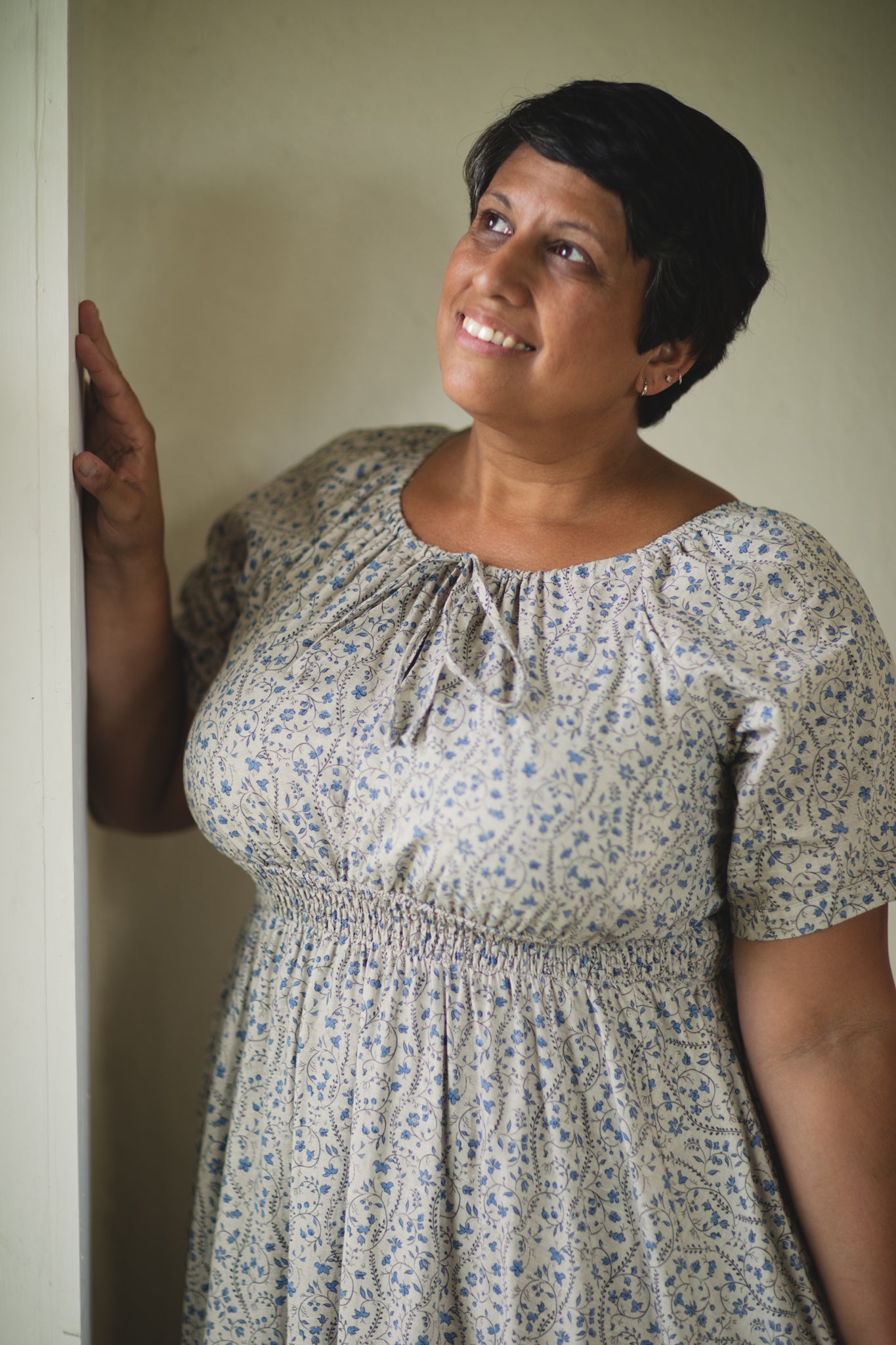 woman in patterned modest nursing dress