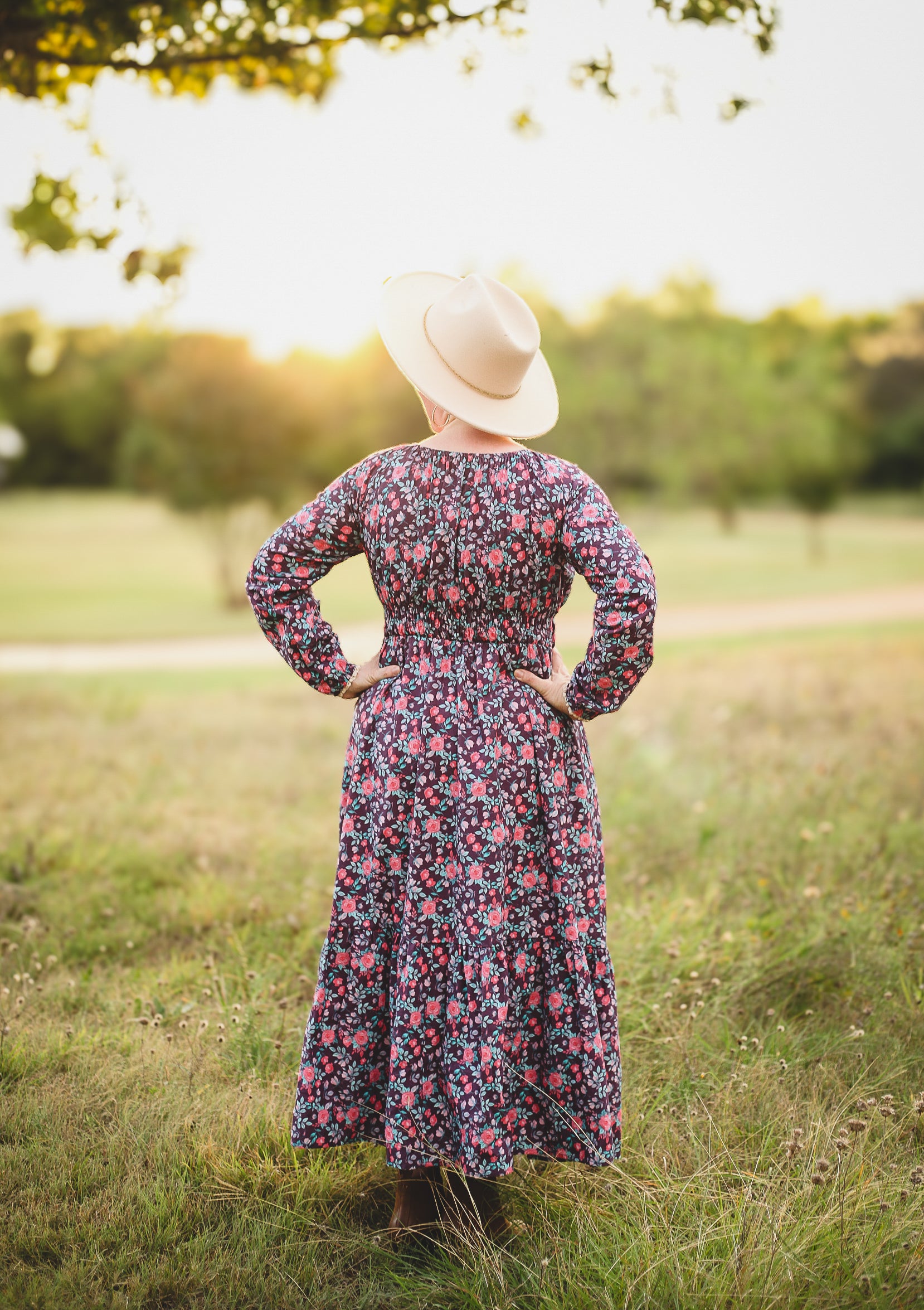 Woman in modest nursing floral dress outdoors