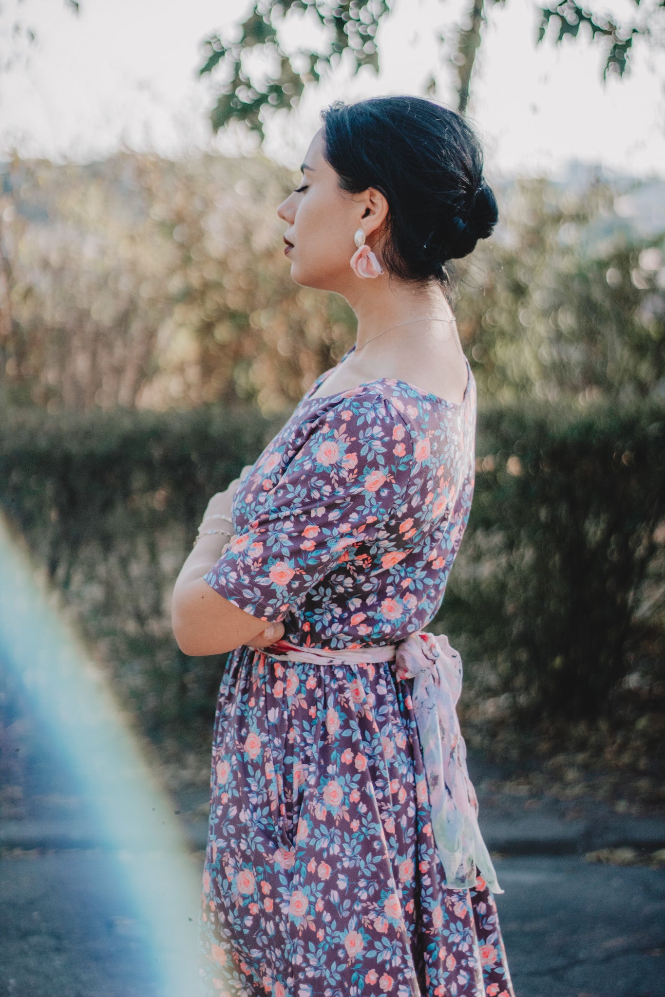 woman wearing a modest nursing floral dress