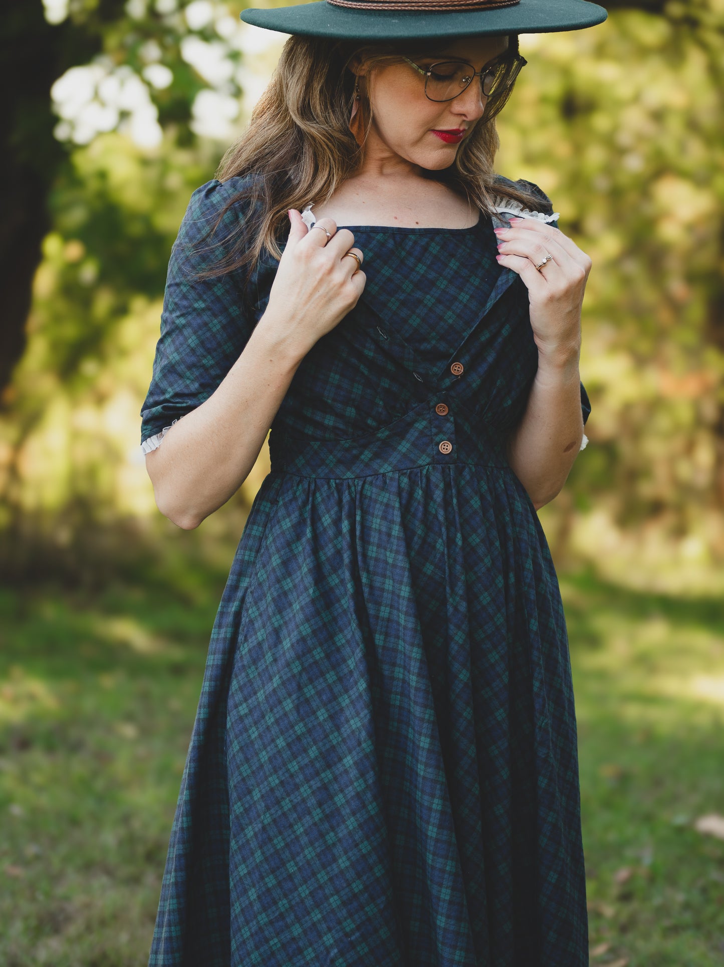 woman wearing a modest nursing blue patterned dress