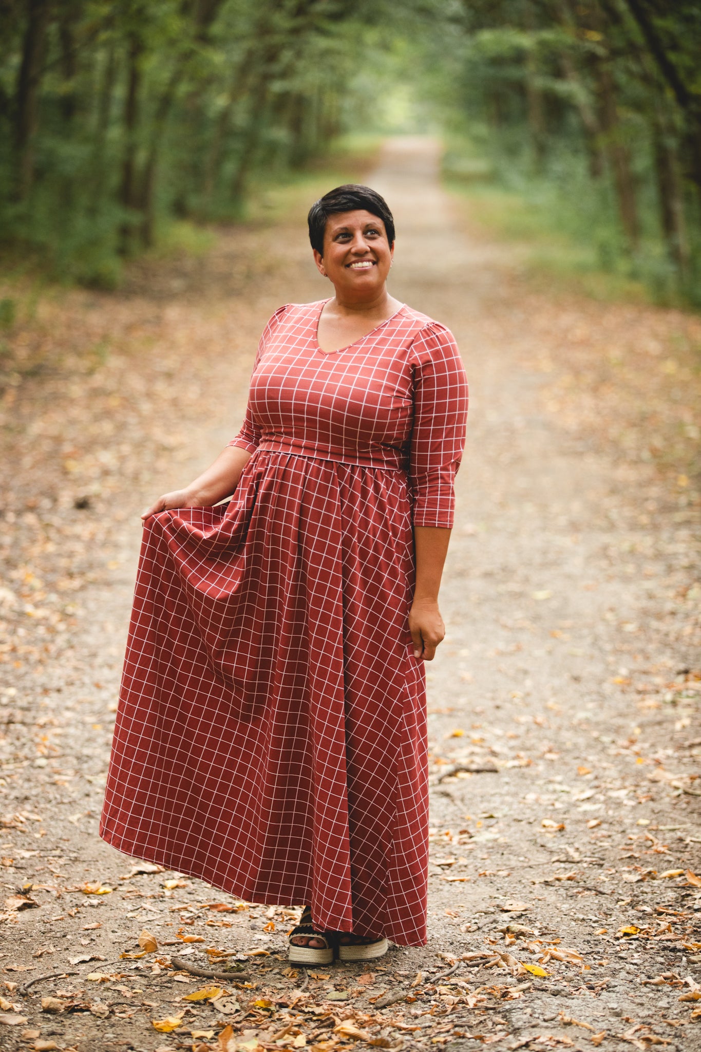 Modest nursing copper dress forest pathway