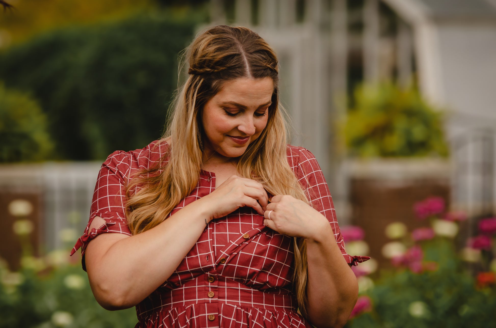 Woman in modest nursing plaid dress outdoors