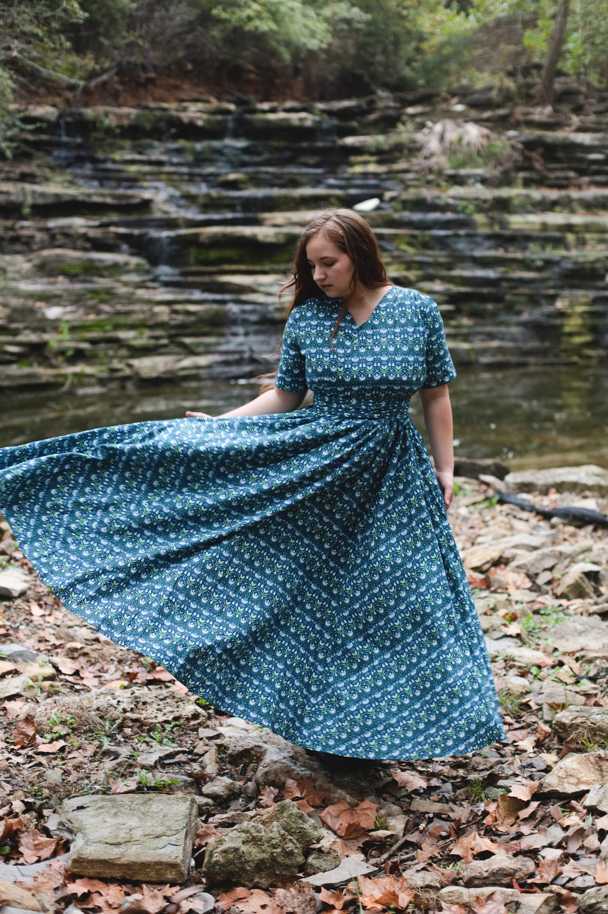 Modest nursing dress by natural water body