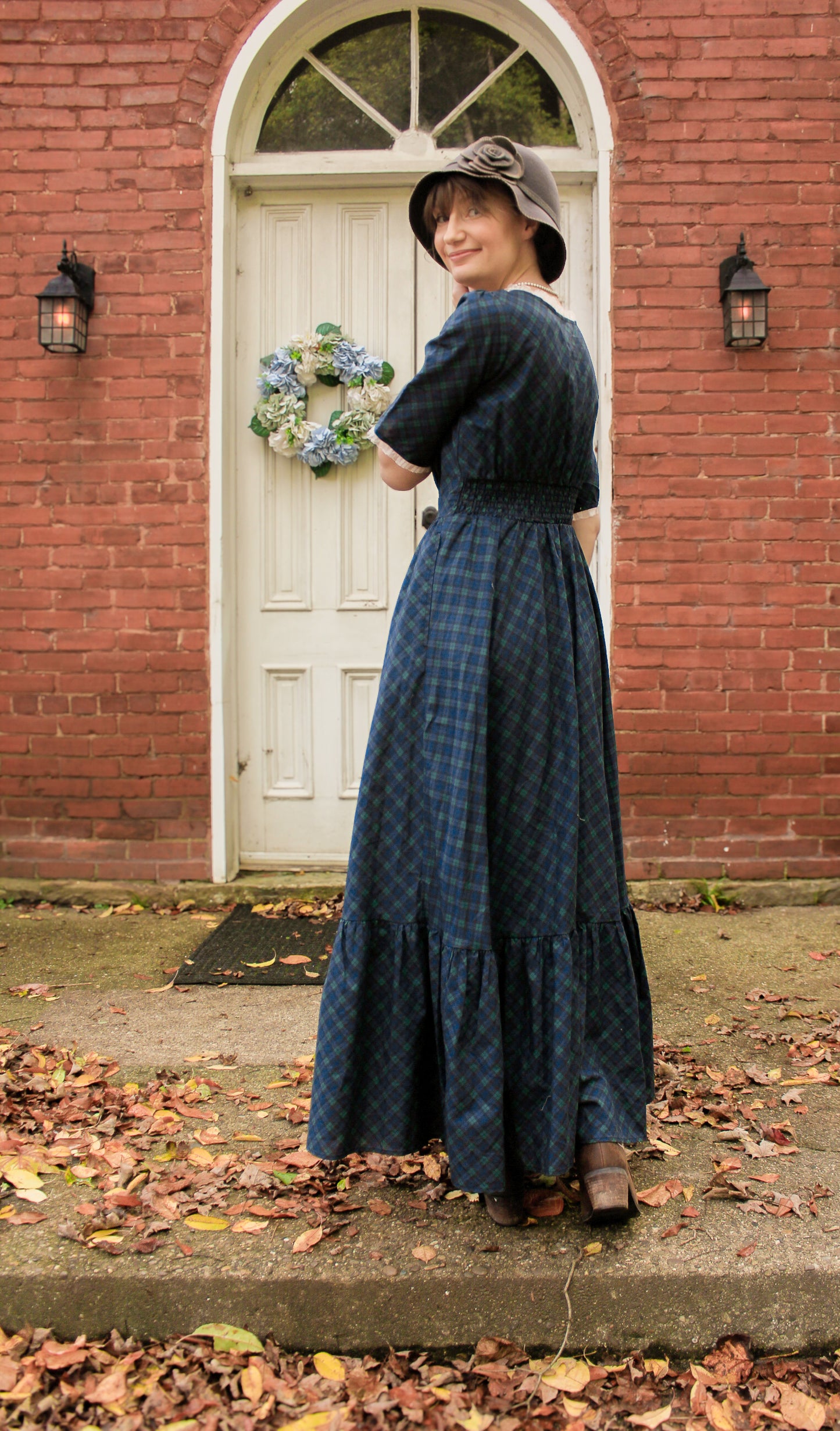 woman wearing a modest nursing blue patterned dress