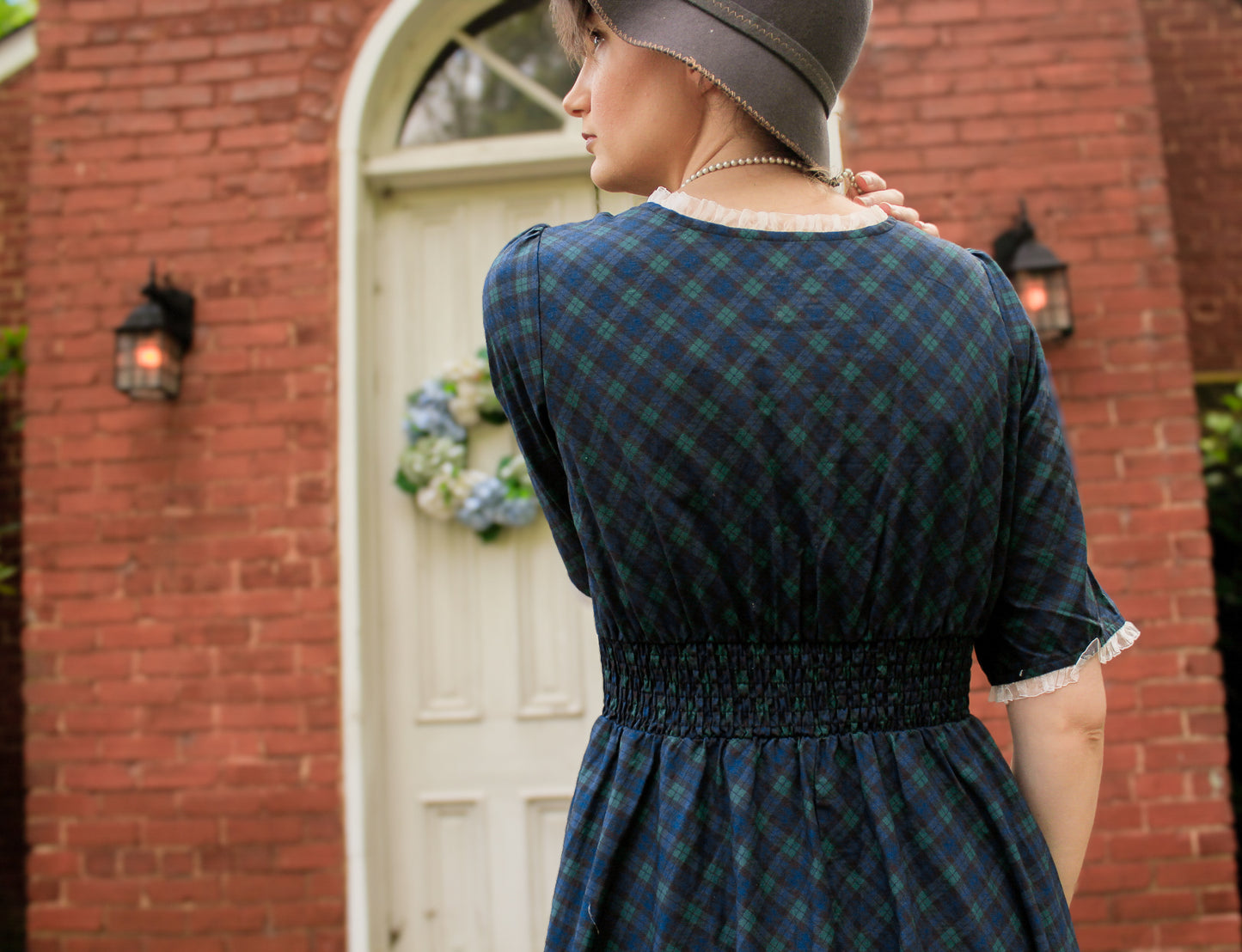 woman wearing a modest nursing blue patterned dress
