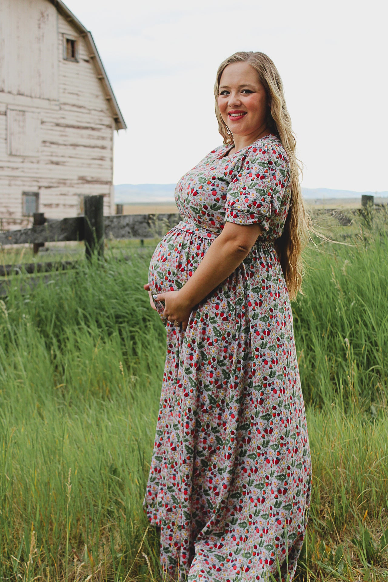 Woman in a floral modest nursing dress.