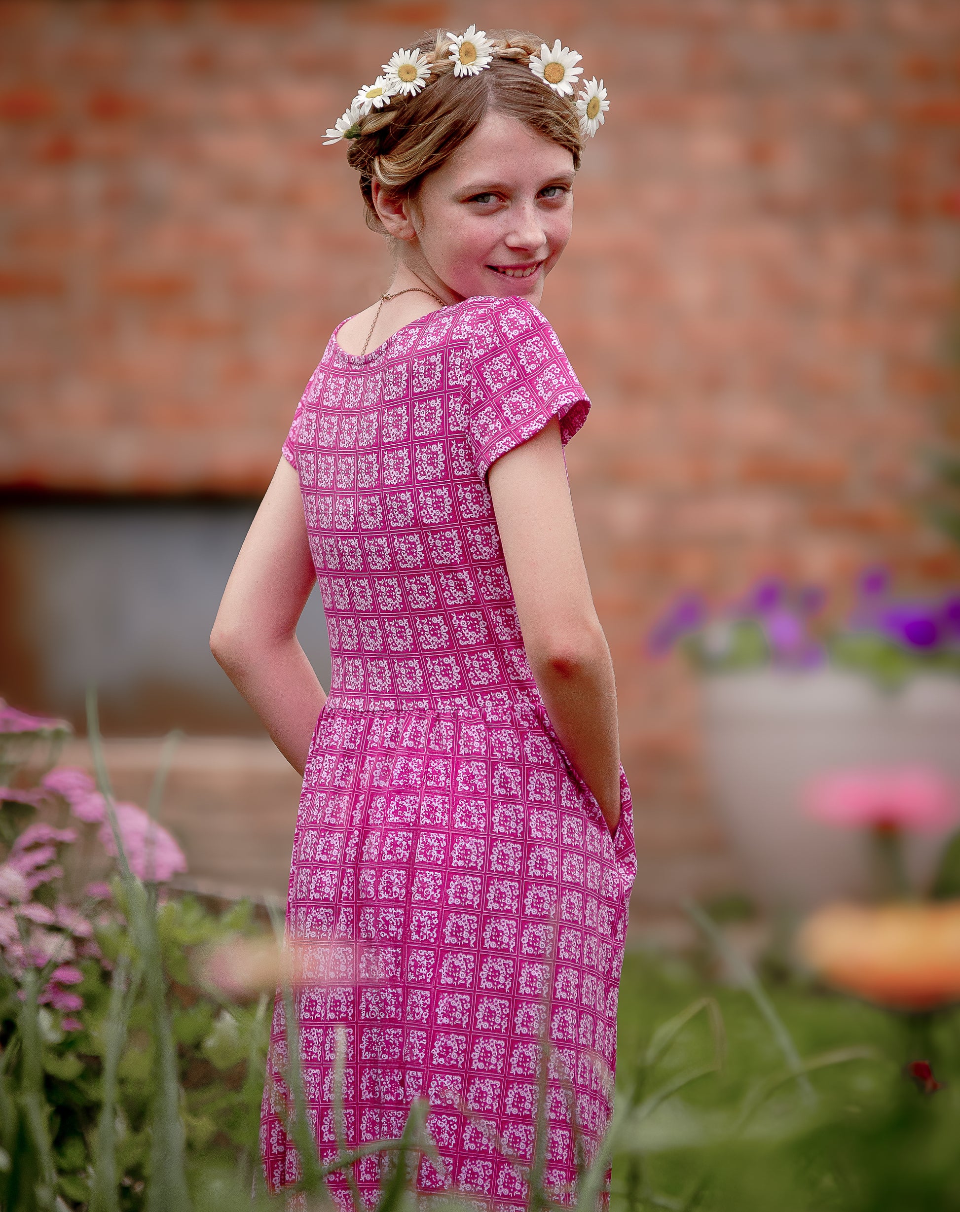 Young girl in a modest pink dress