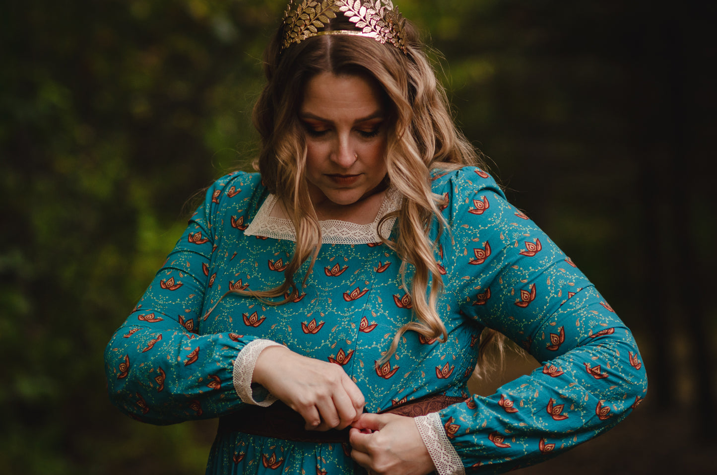Woman in modest nursing teal dress outdoors