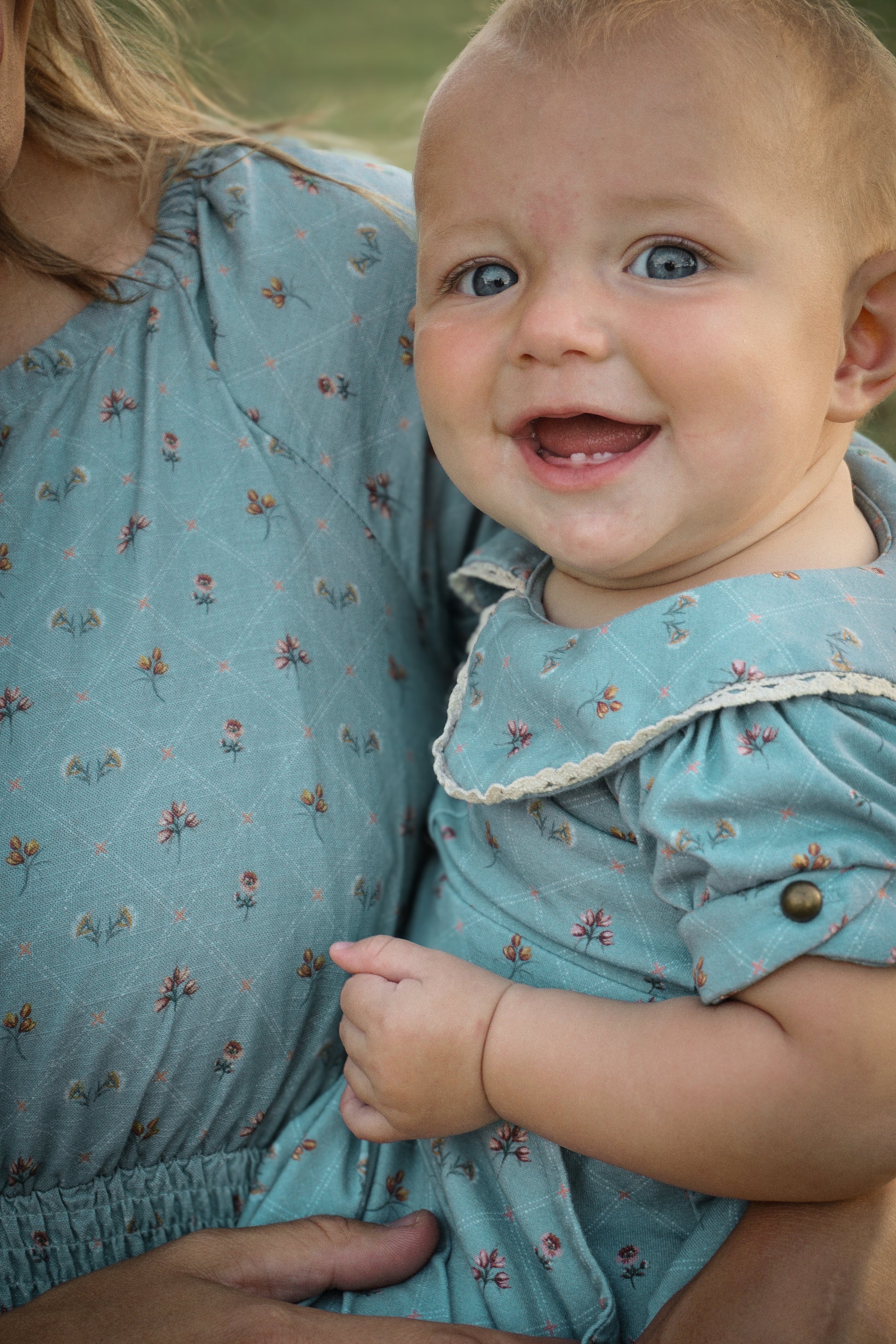 Baby in a blue dress