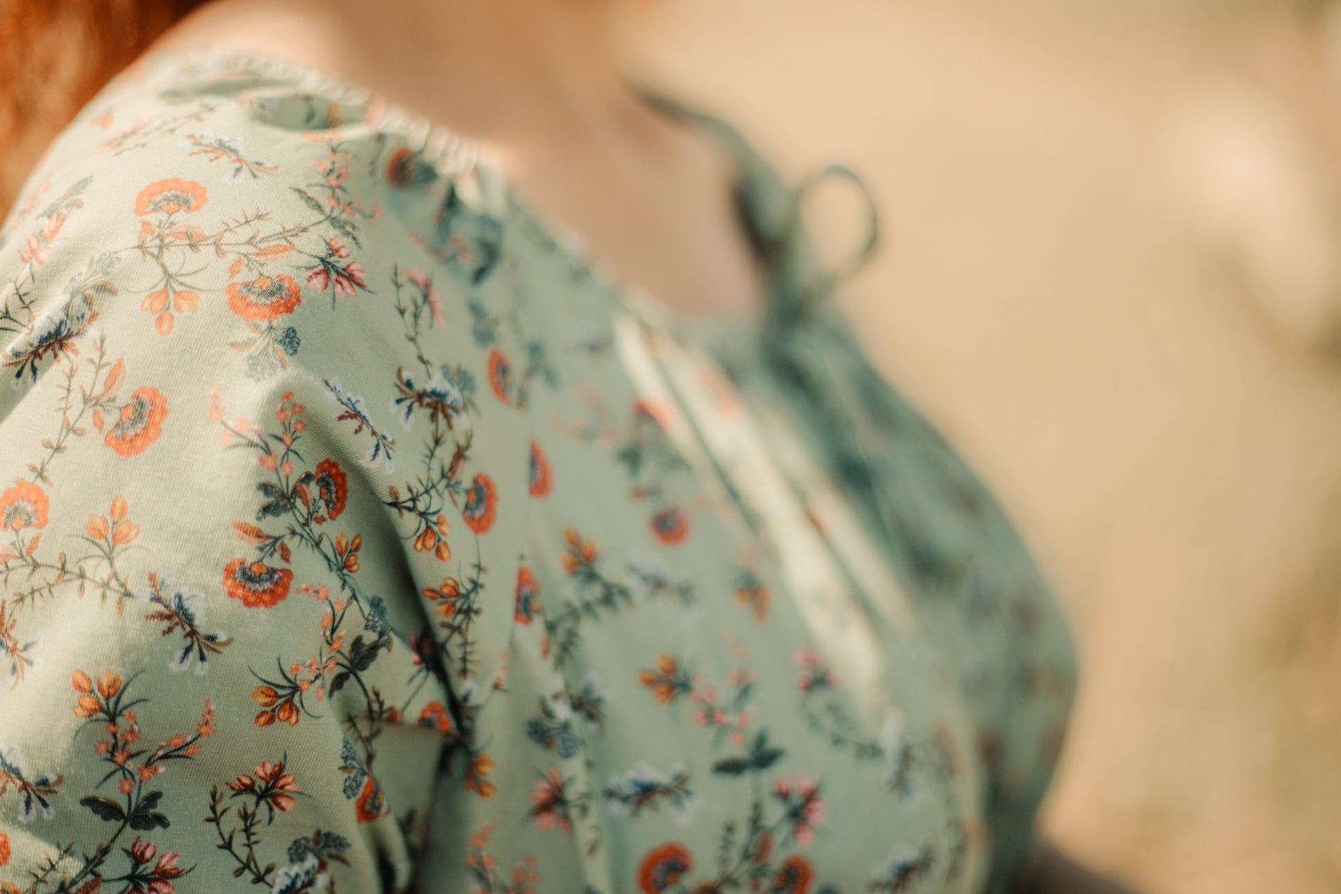 Woman in modest nursing floral dress outdoors