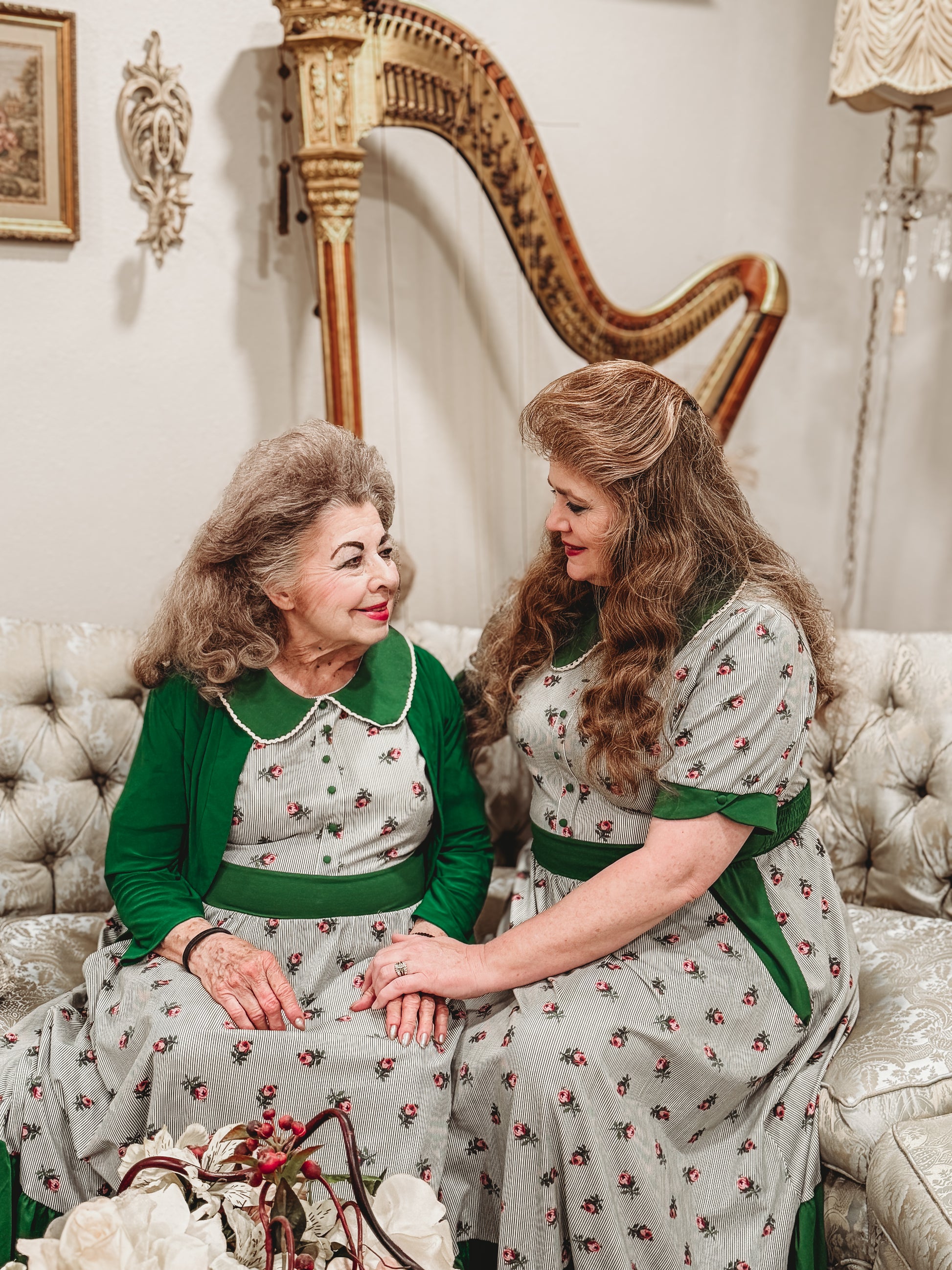 women wearing green and white striped modest nursing dresses
