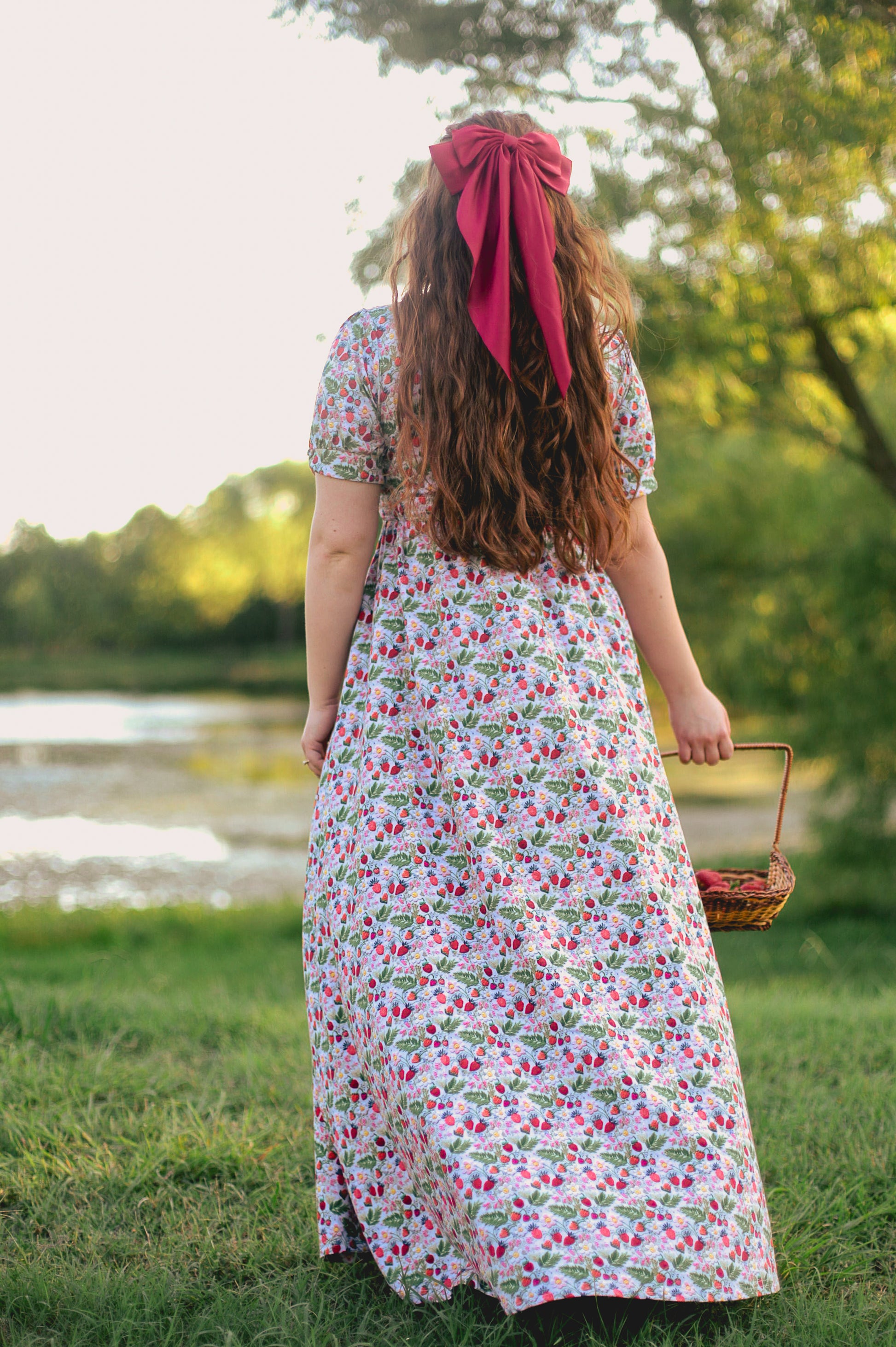 Woman in a floral modest nursing dress.
