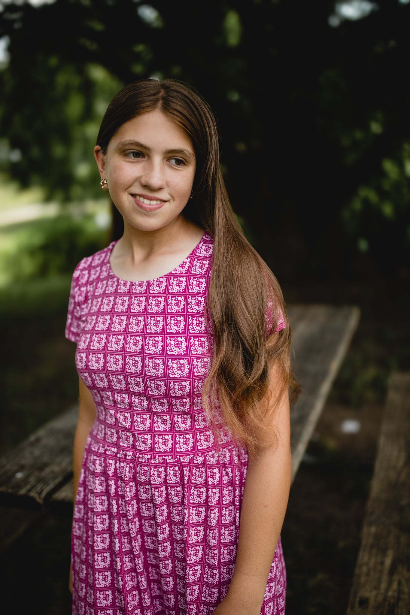 Young girl in a modest pink dress