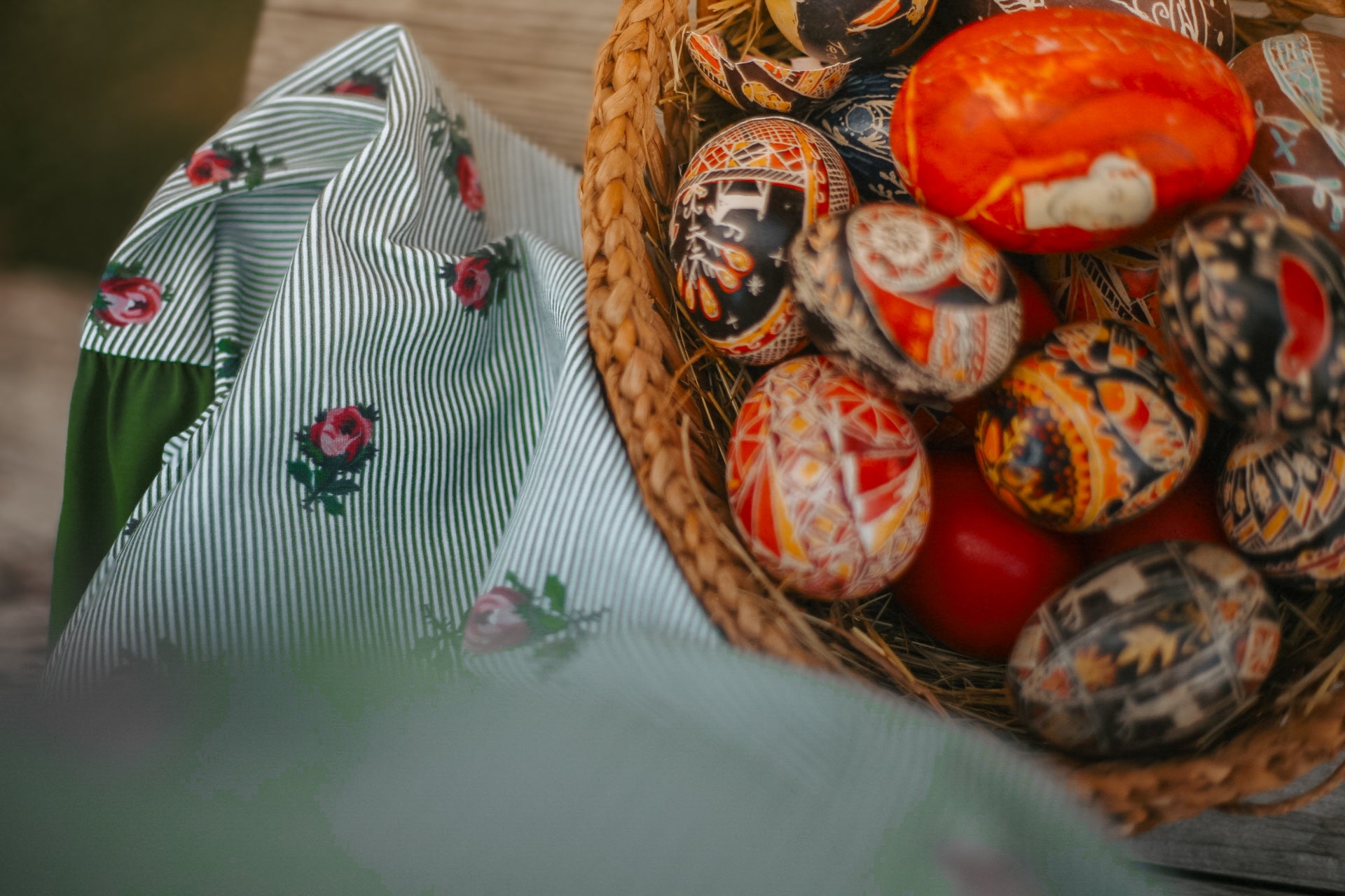 woman wearing a green and white striped modest nursing dress