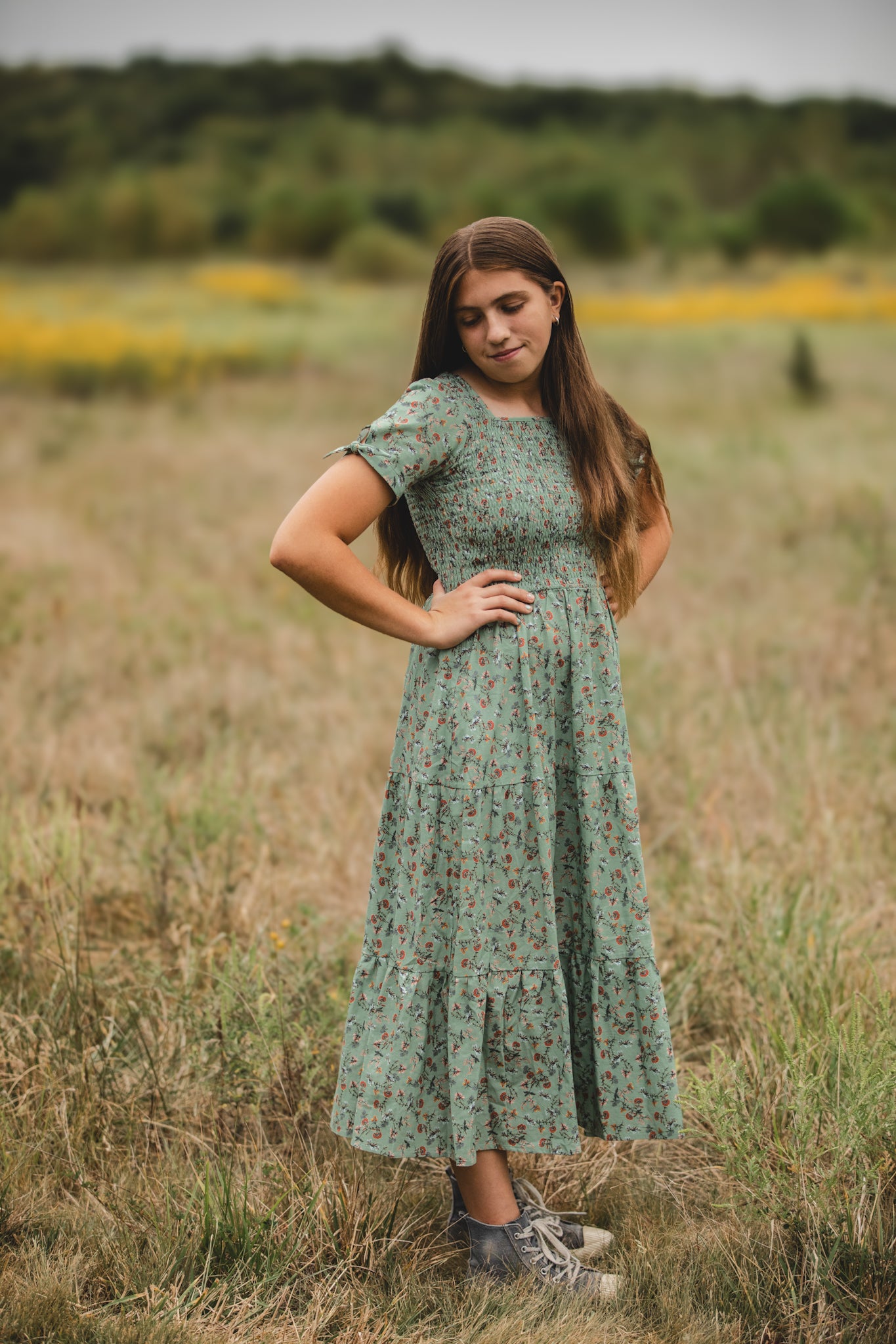 woman wearing a modest nursing green floral dress