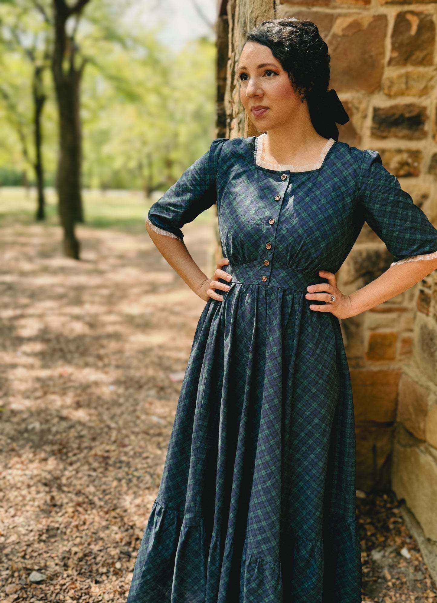 woman wearing a modest nursing blue patterned dress