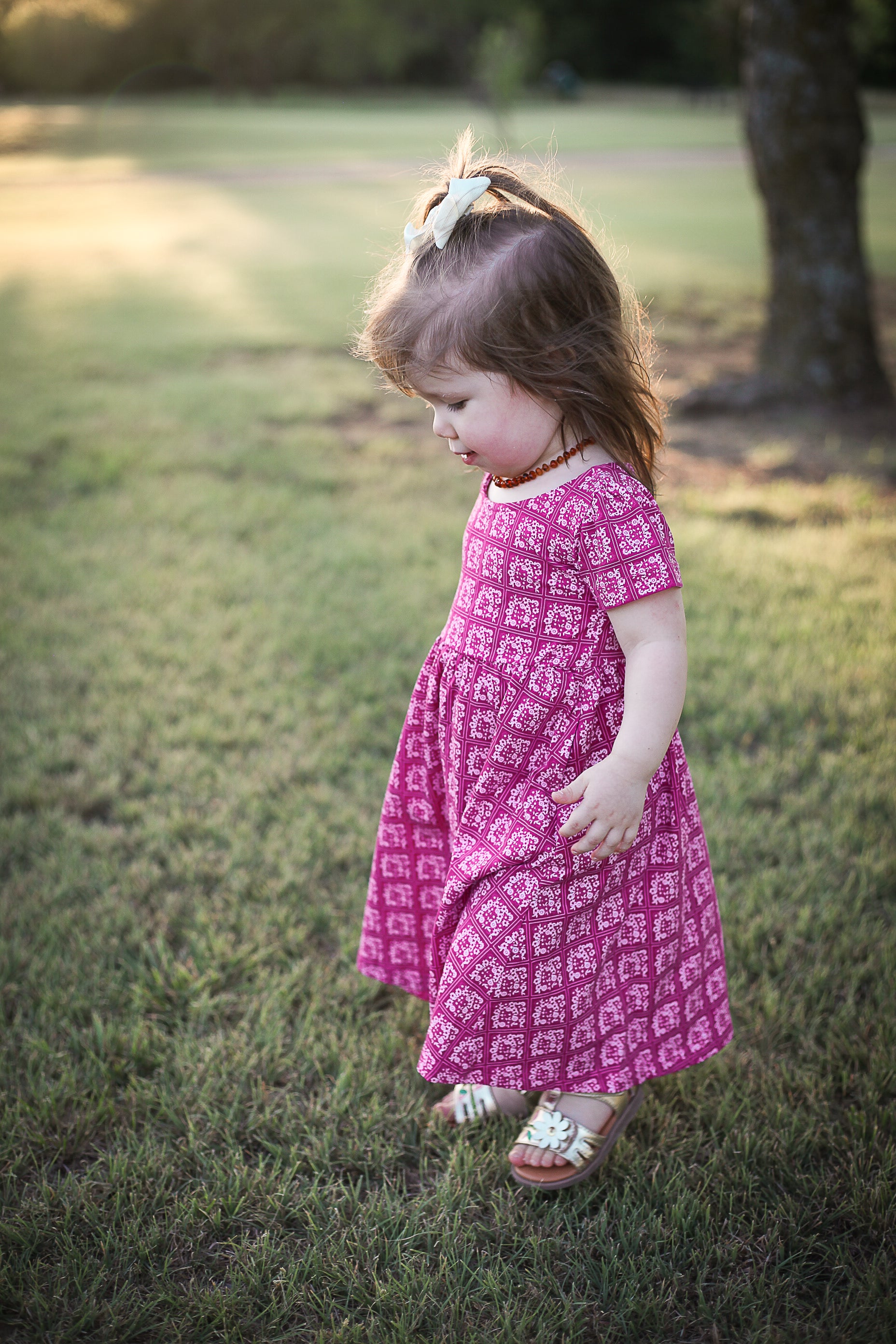 Young girl in a modest pink dress