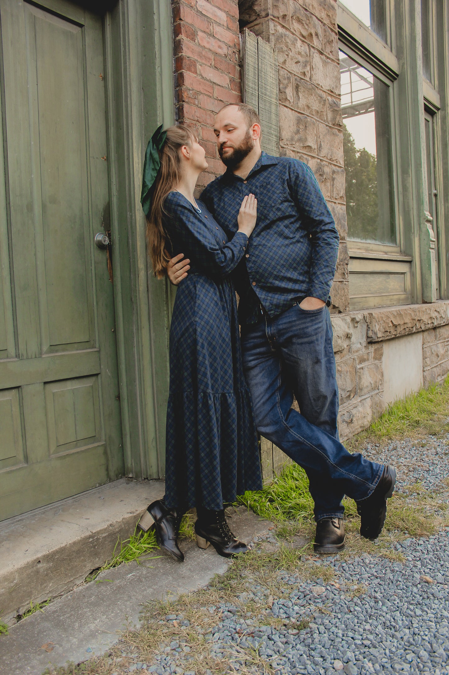 Woman in modest nursing dress with husband outdoors