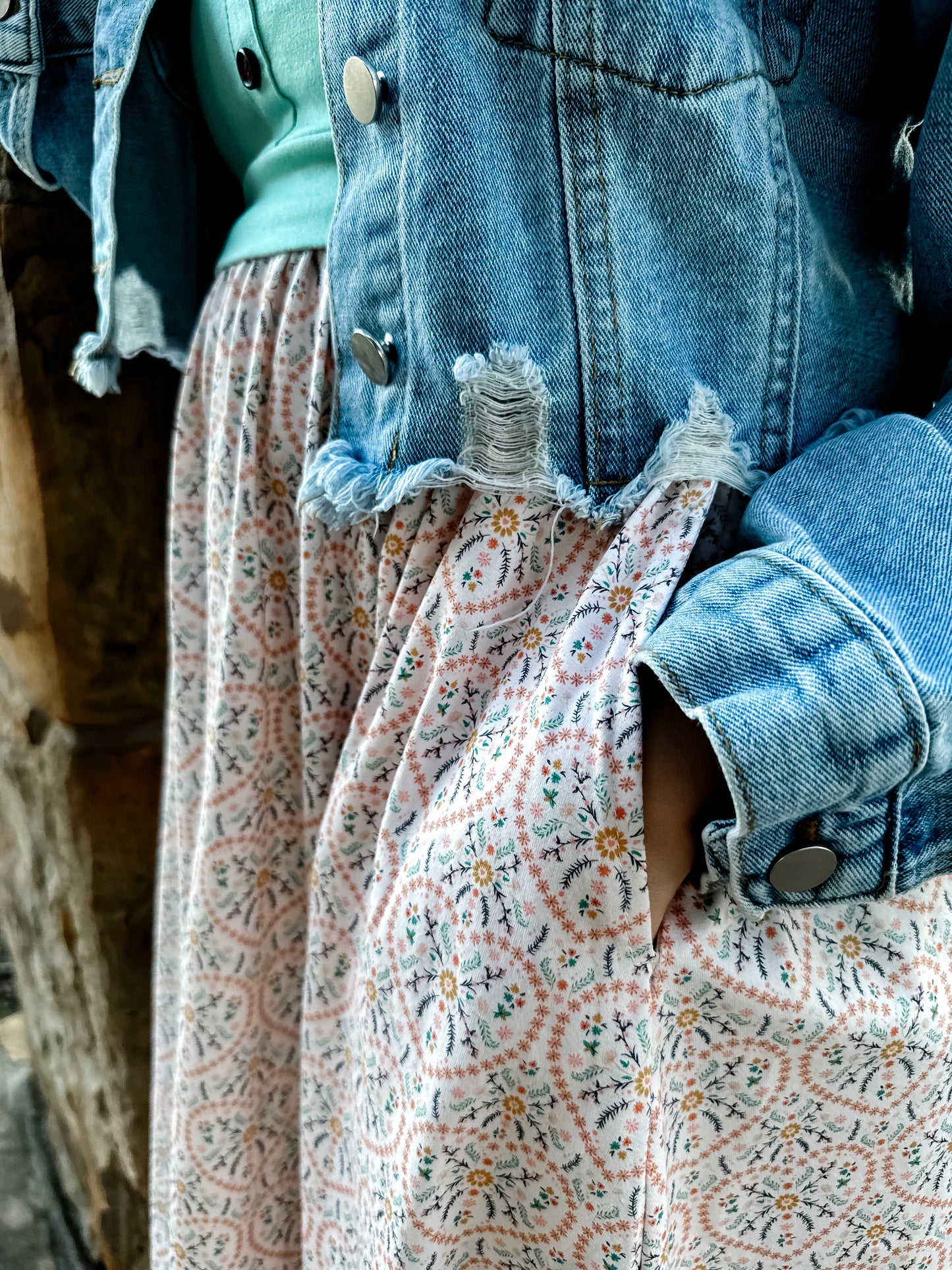 A woman wearing a vintage style modest nursing dress.