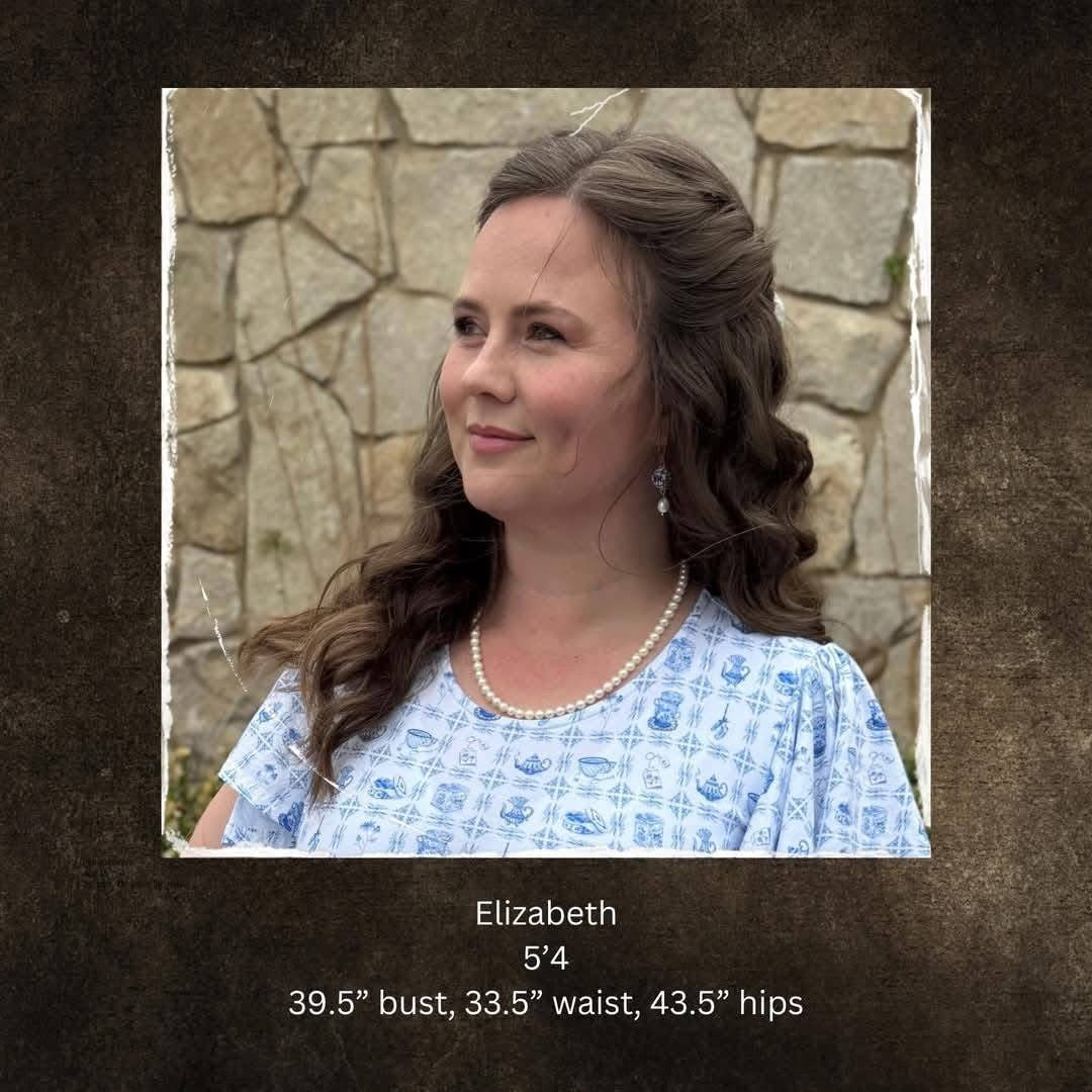 woman wearing a vintage-style green and white modest nursing dress