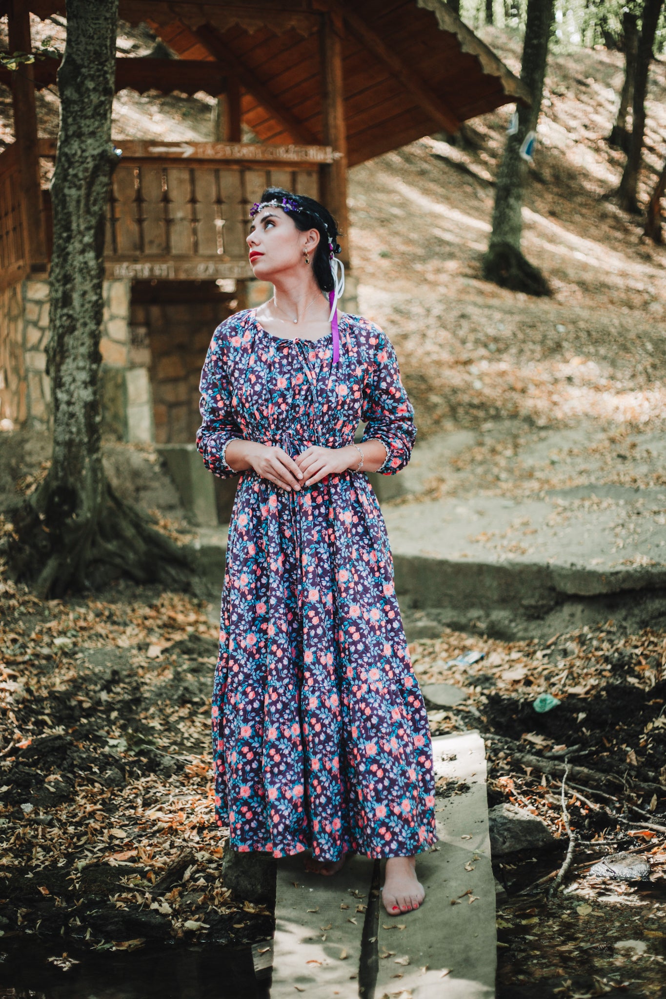 Woman in modest nursing dress, floral print