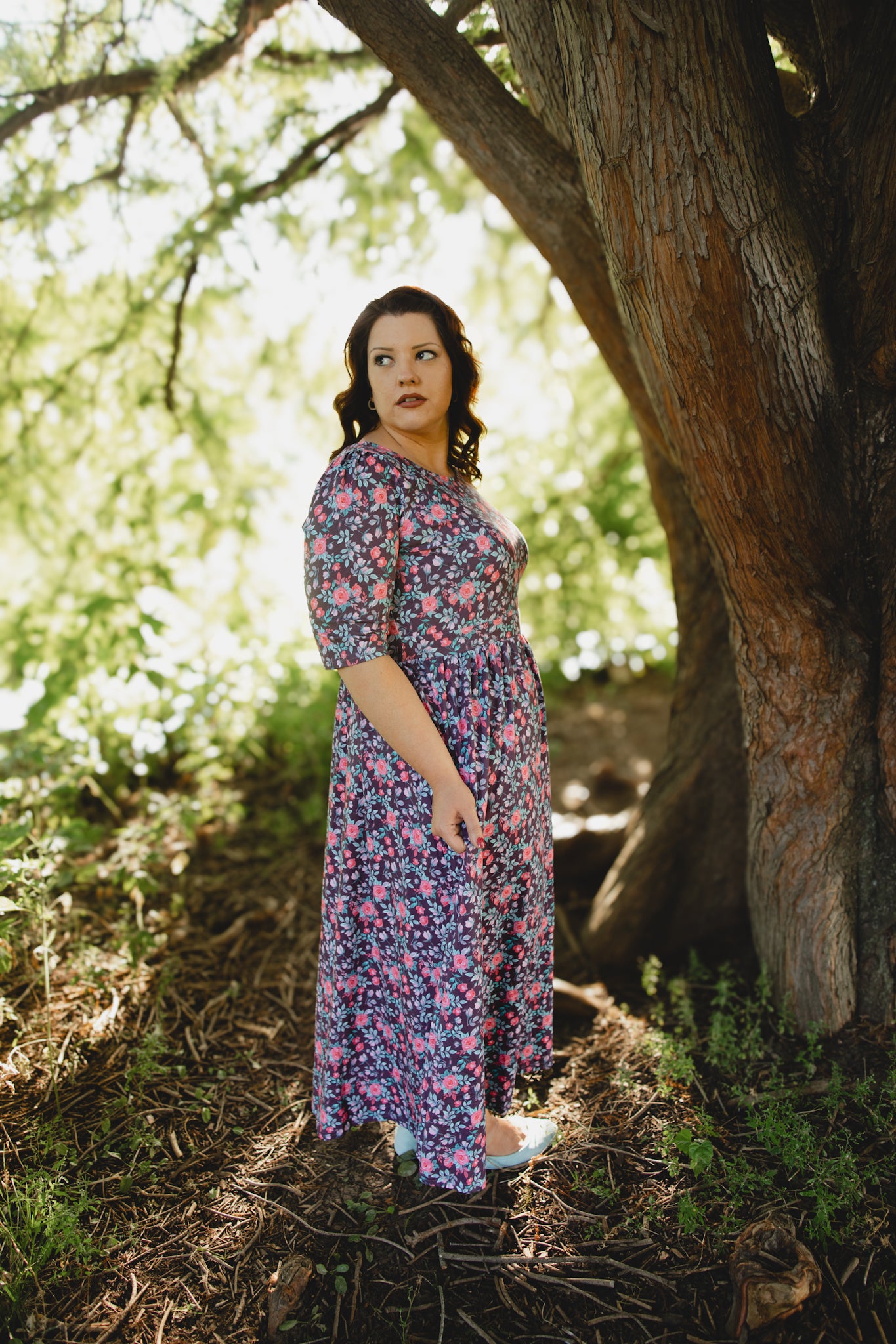 woman wearing a modest nursing floral dress