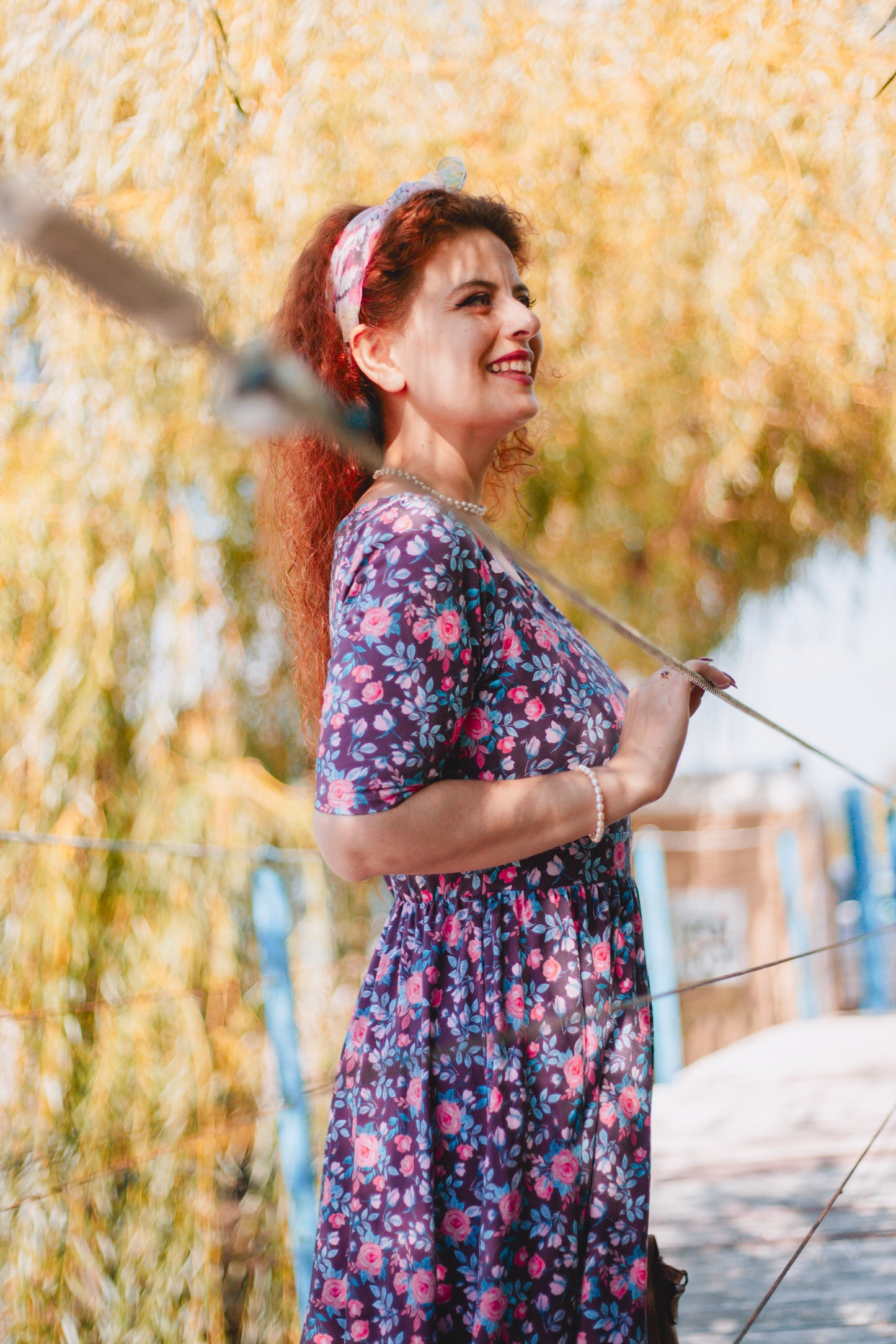 woman wearing a modest nursing floral dress