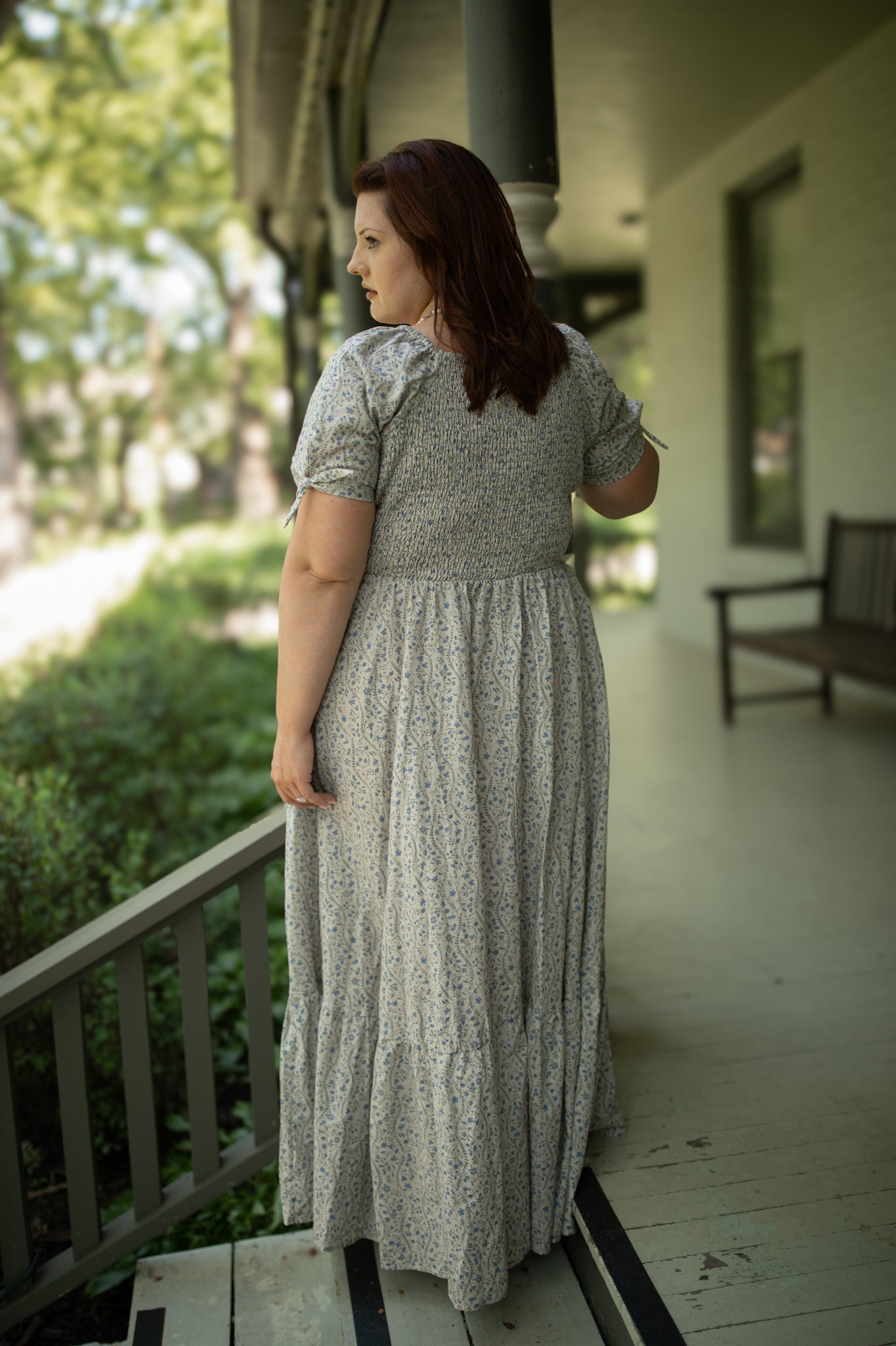 woman in patterned modest nursing dress
