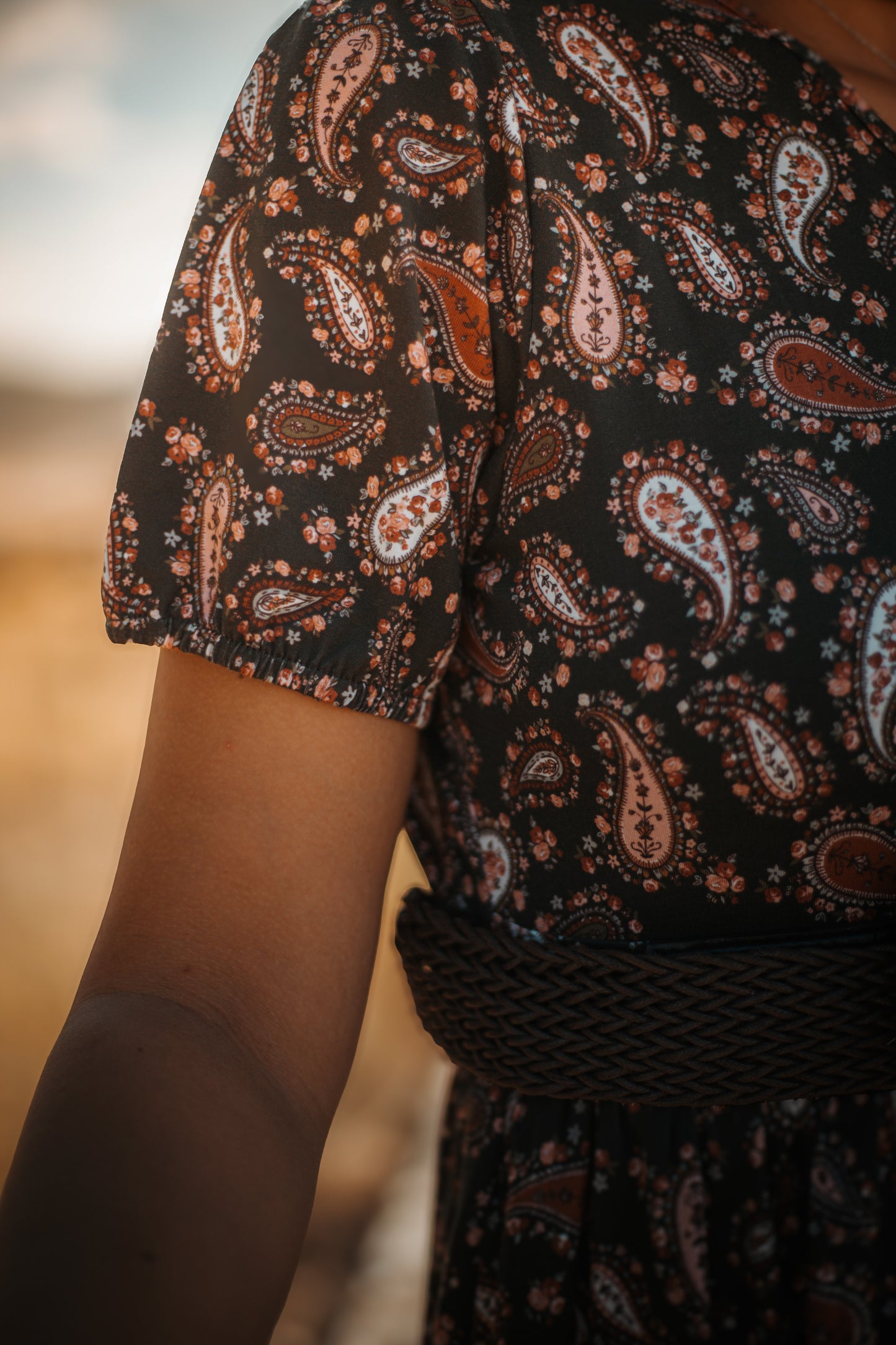 woman wearing a modest nursing floral dress