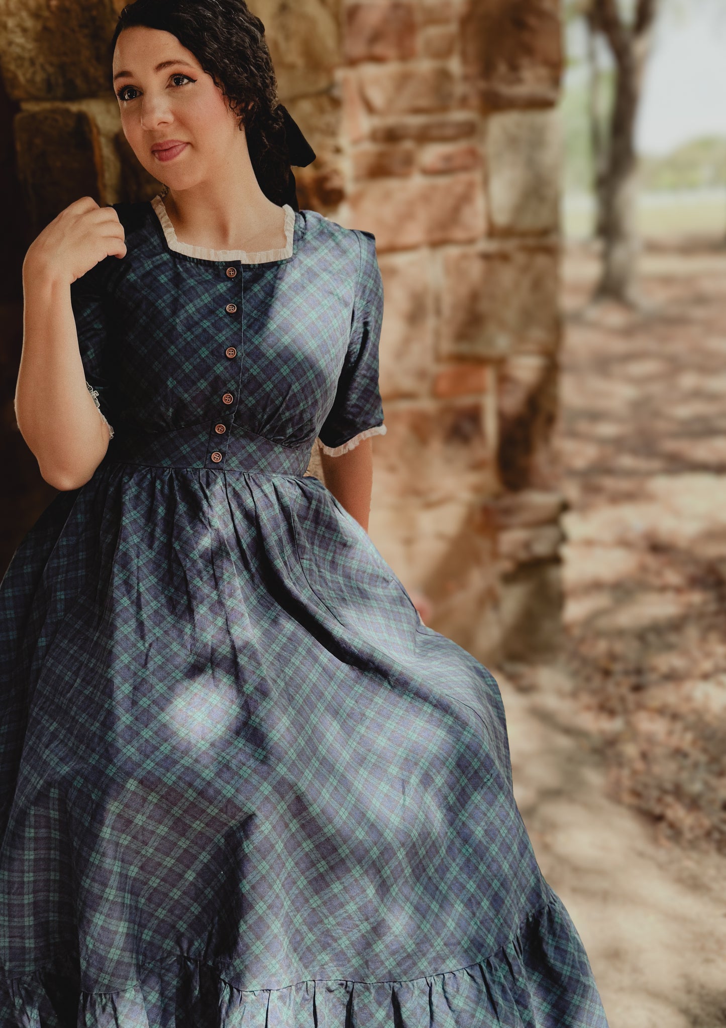 woman wearing a modest nursing blue patterned dress