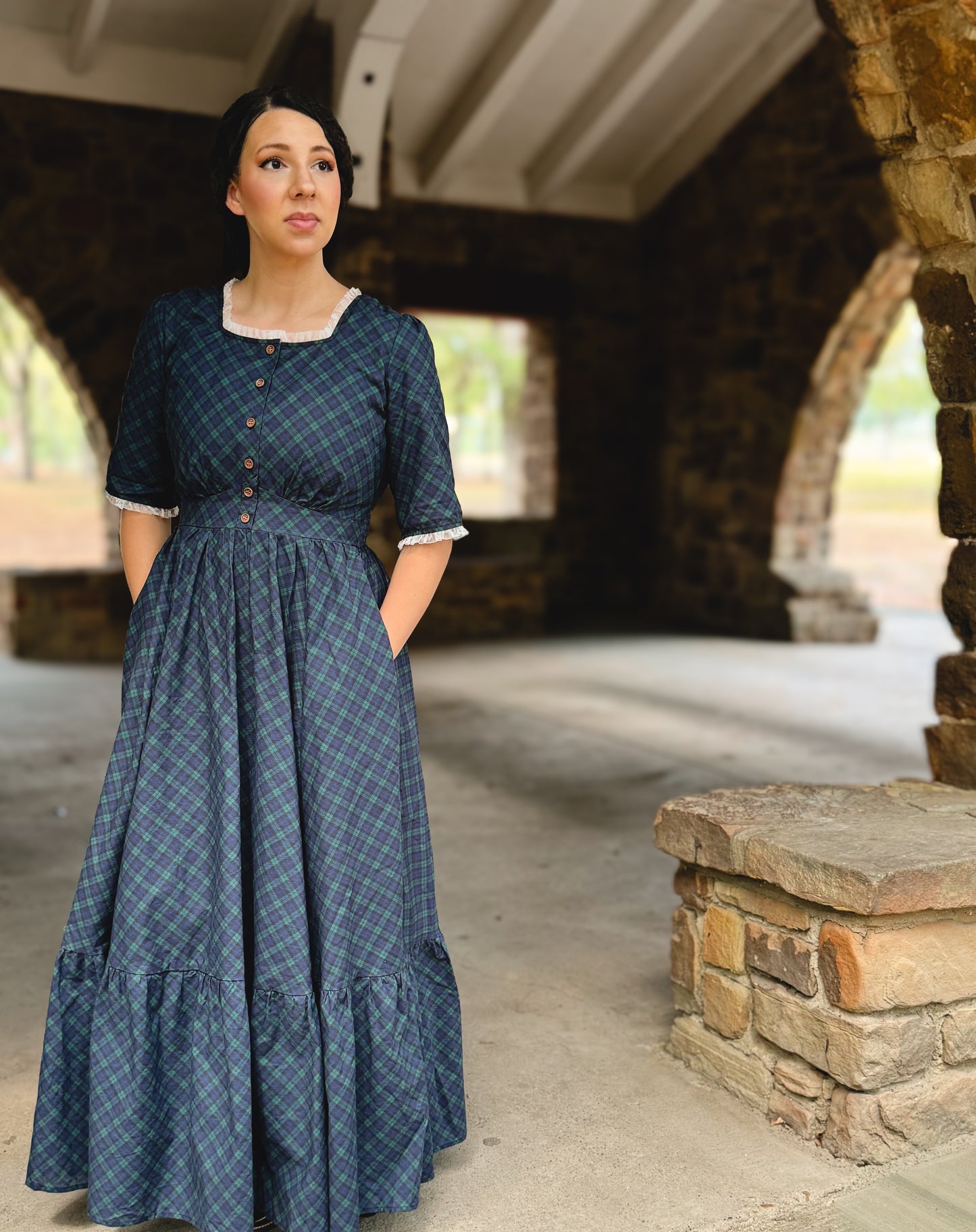 woman wearing a modest nursing blue patterned dress
