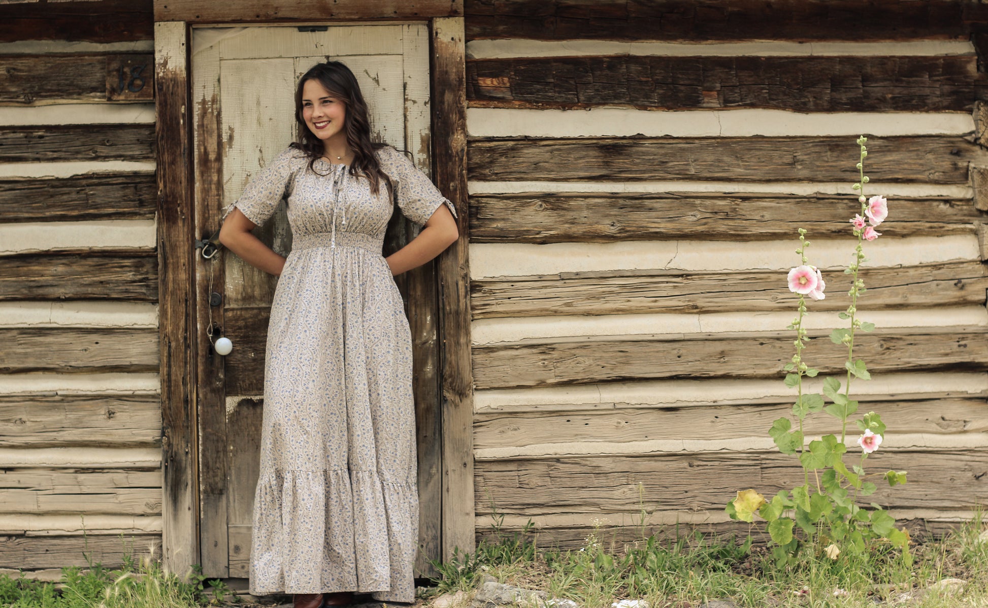 woman in patterned modest nursing dress