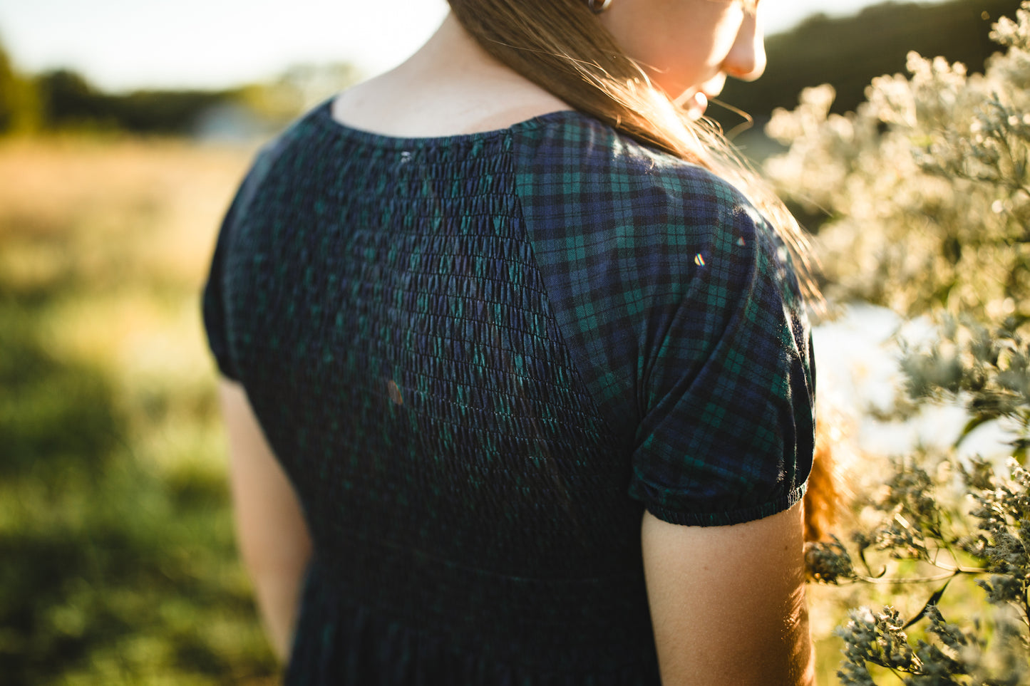 Woman in modest nursing dress outdoors