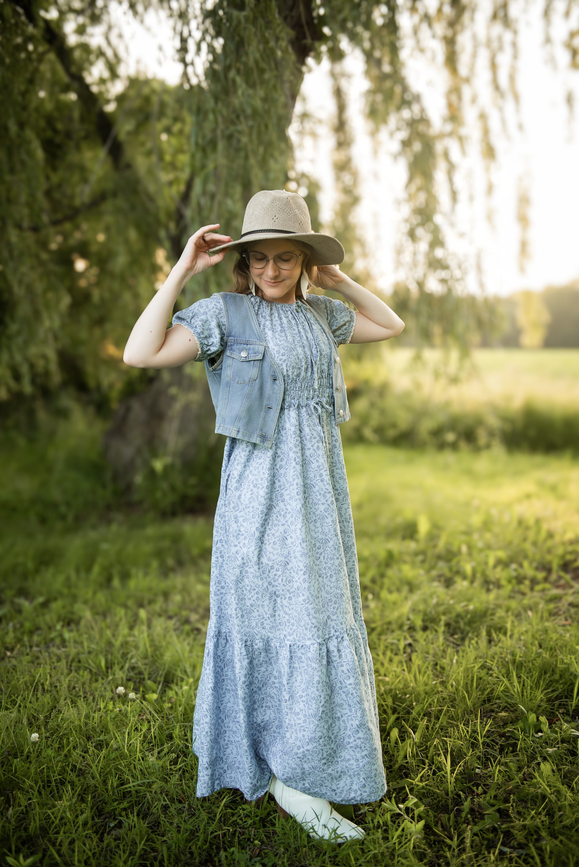 woman in a modest blue nursing dress