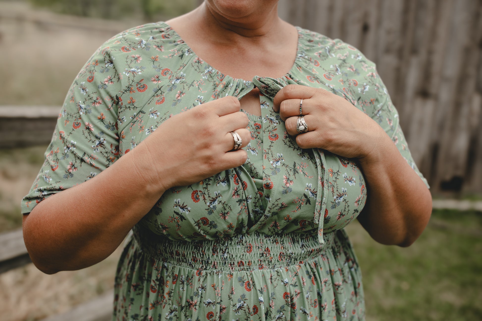 Woman in modest nursing floral dress outdoors