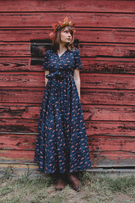 Woman in modest nursing dress, blue floral