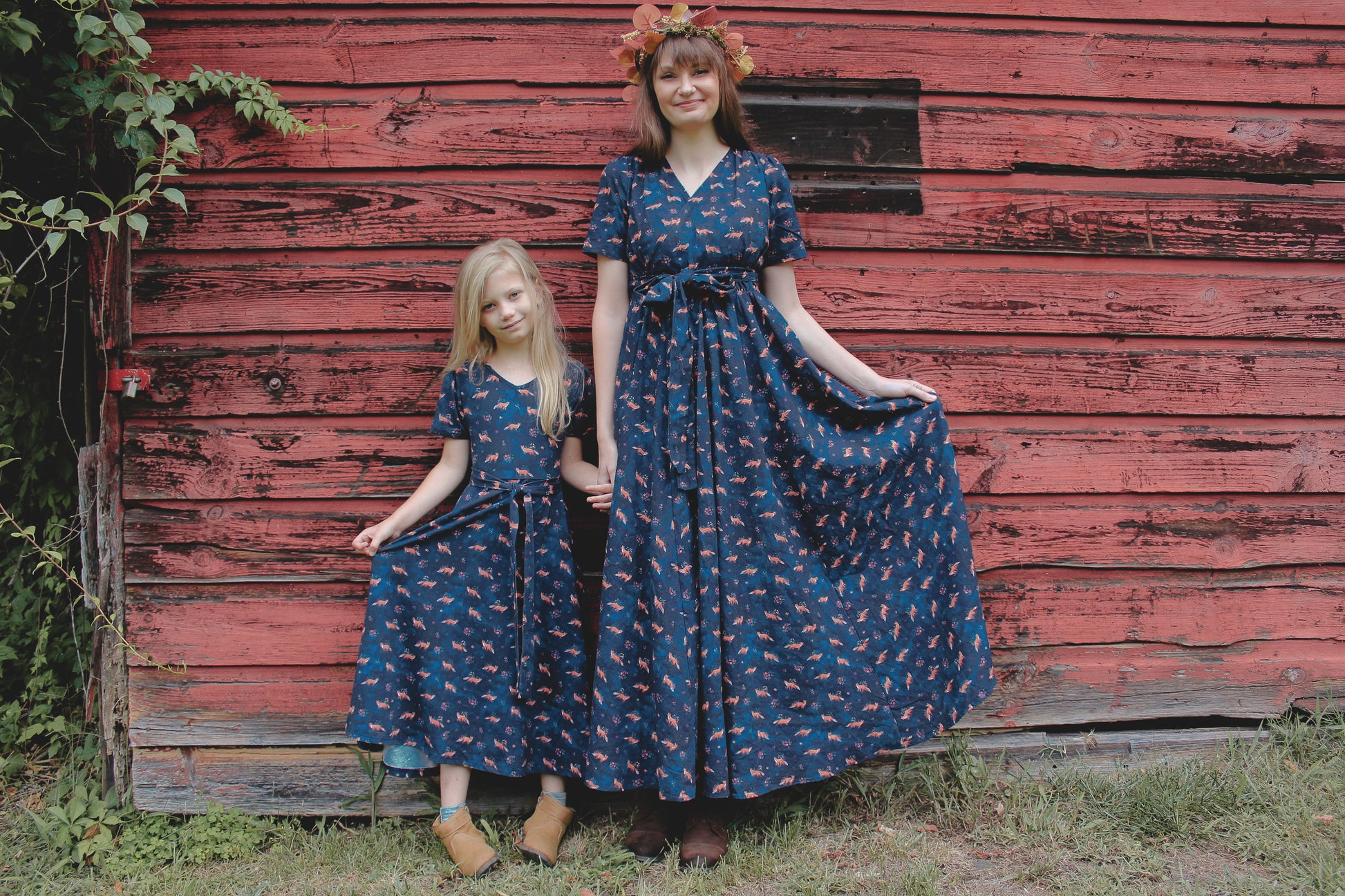 Two women in modest nursing dresses