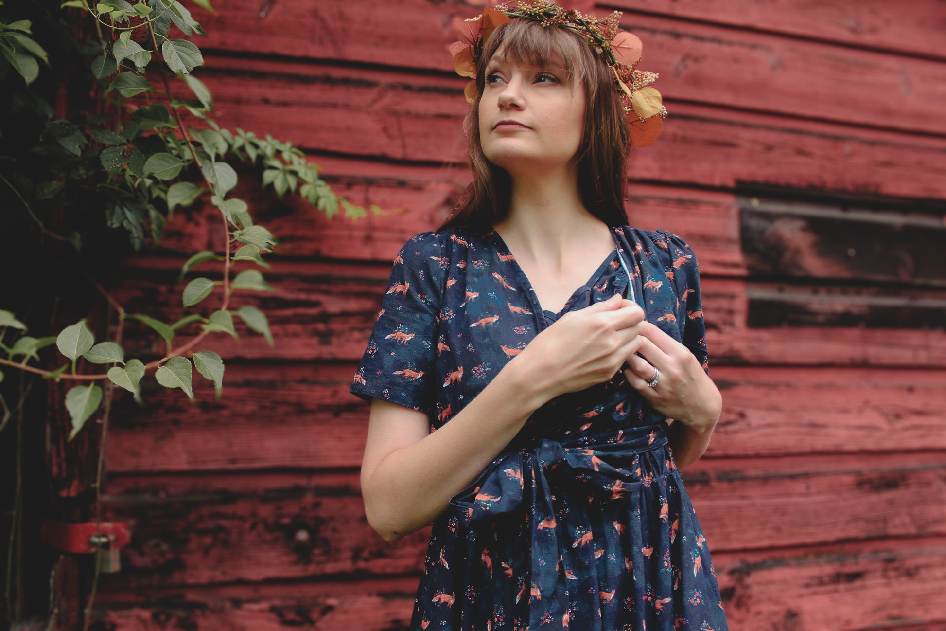 Woman in modest nursing dress with headband