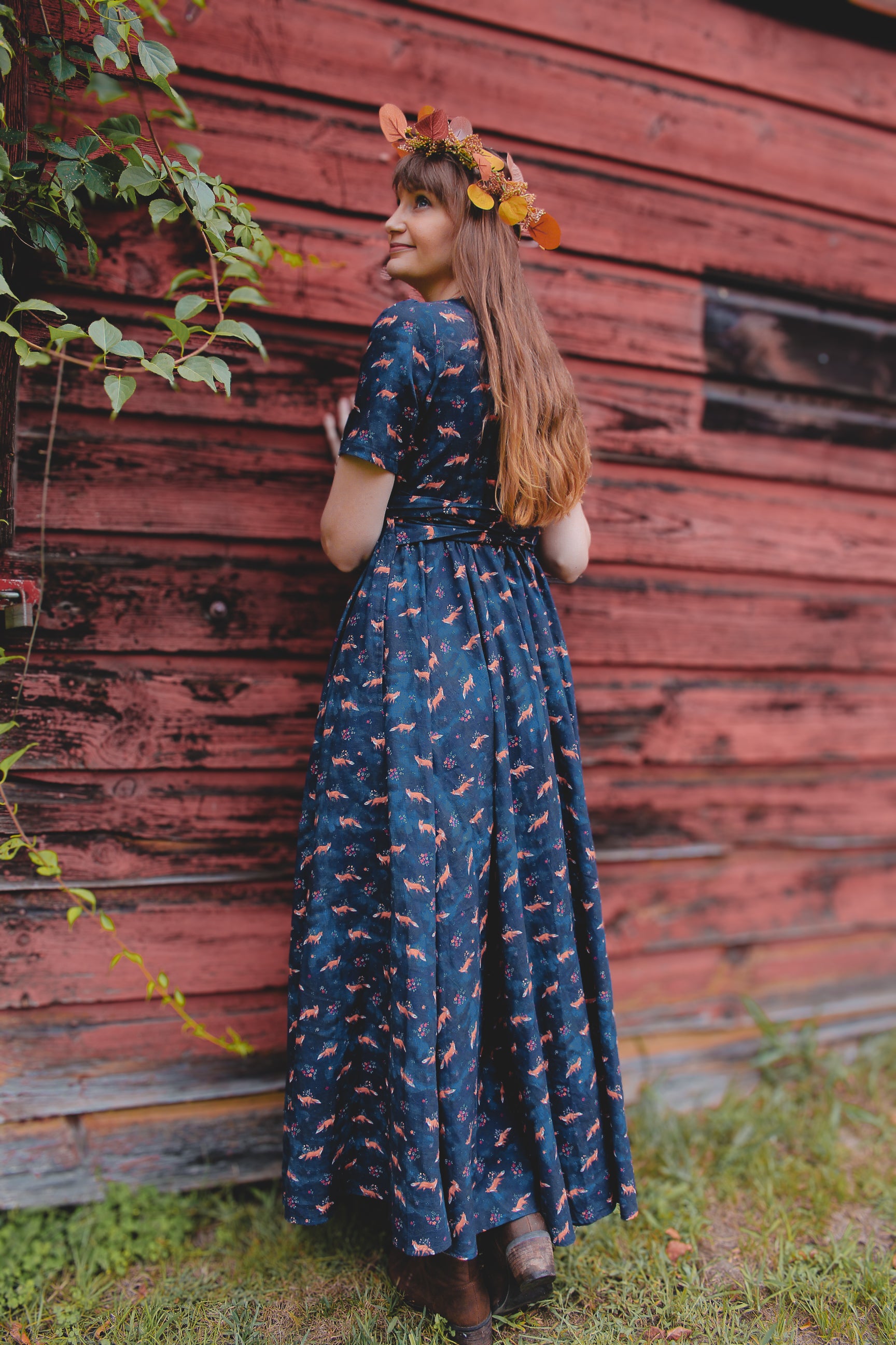 Woman in modest nursing dress, blue floral