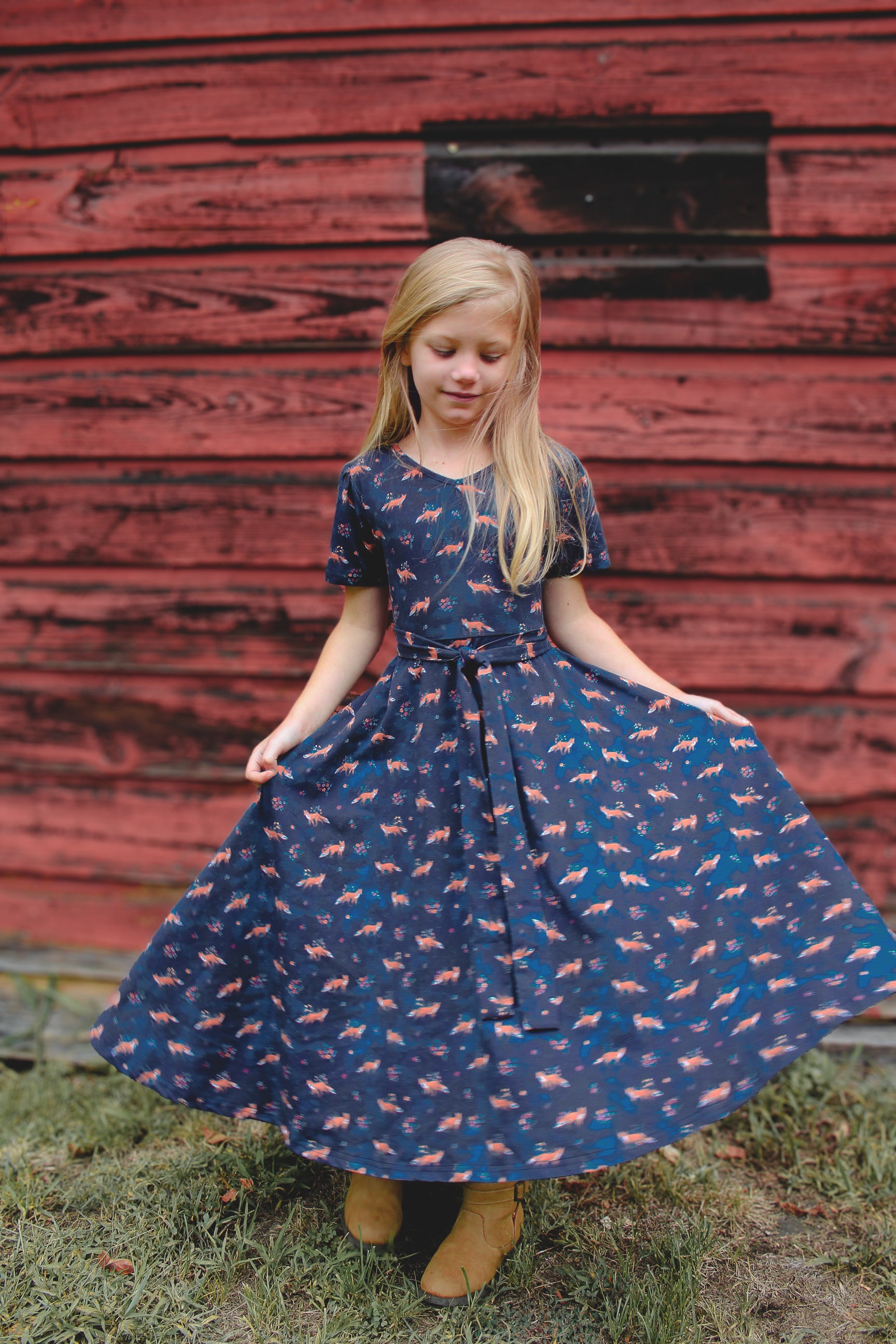 Young girl in modest blue fox dress