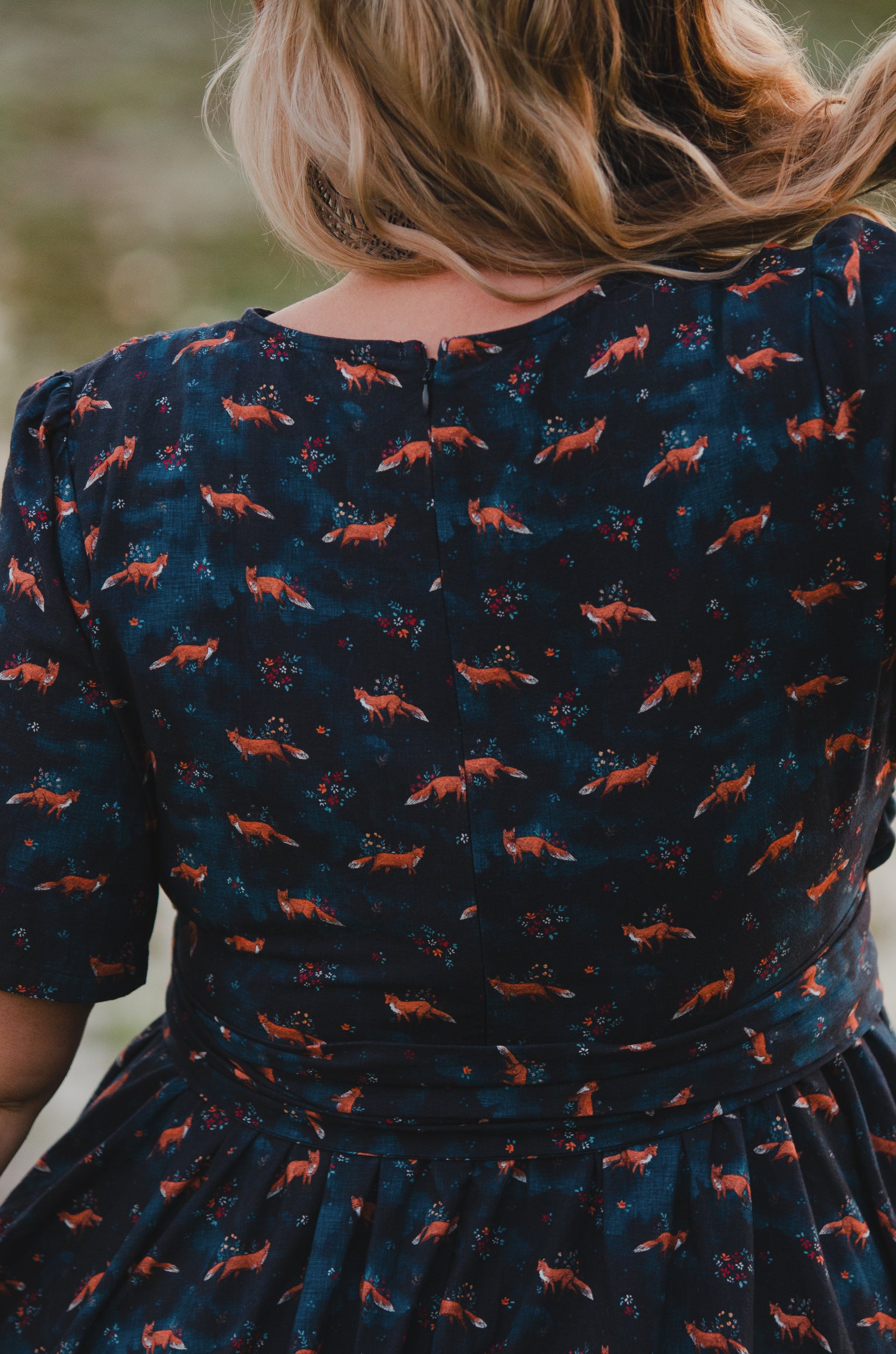 Woman in modest nursing dress, fox pattern