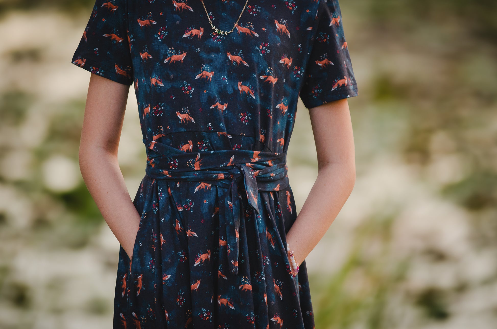Person in modest blue fox dress