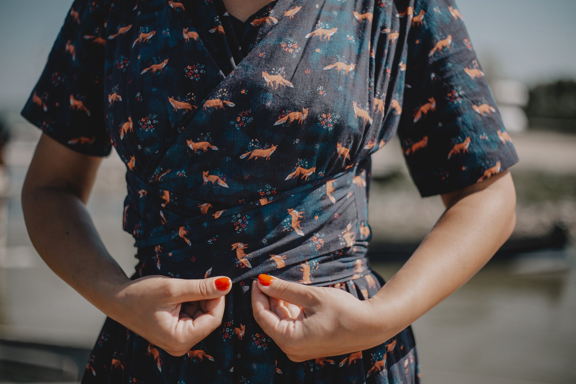 Woman in modest nursing dress with scissors