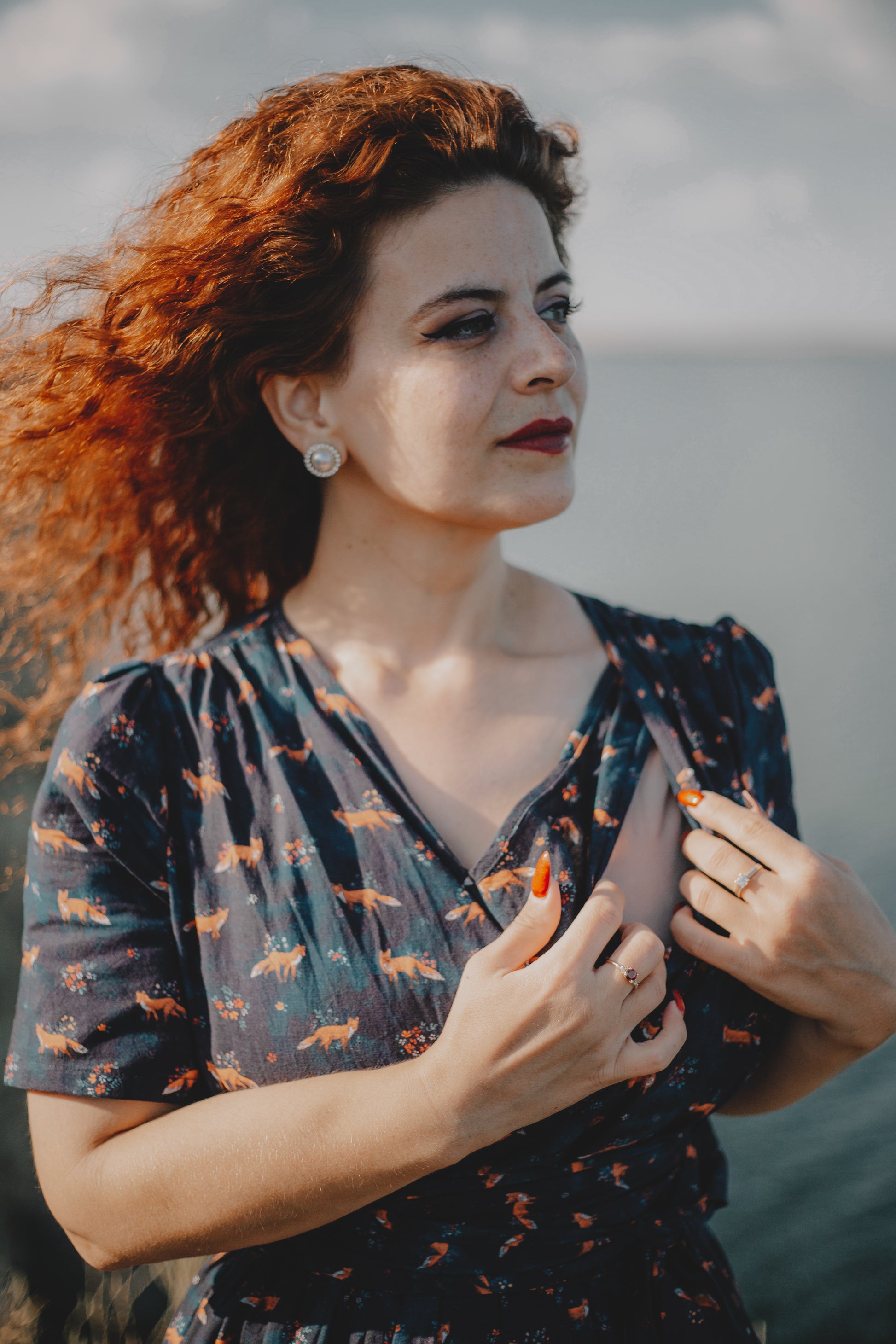 Woman in modest nursing dress, navy fox pattern