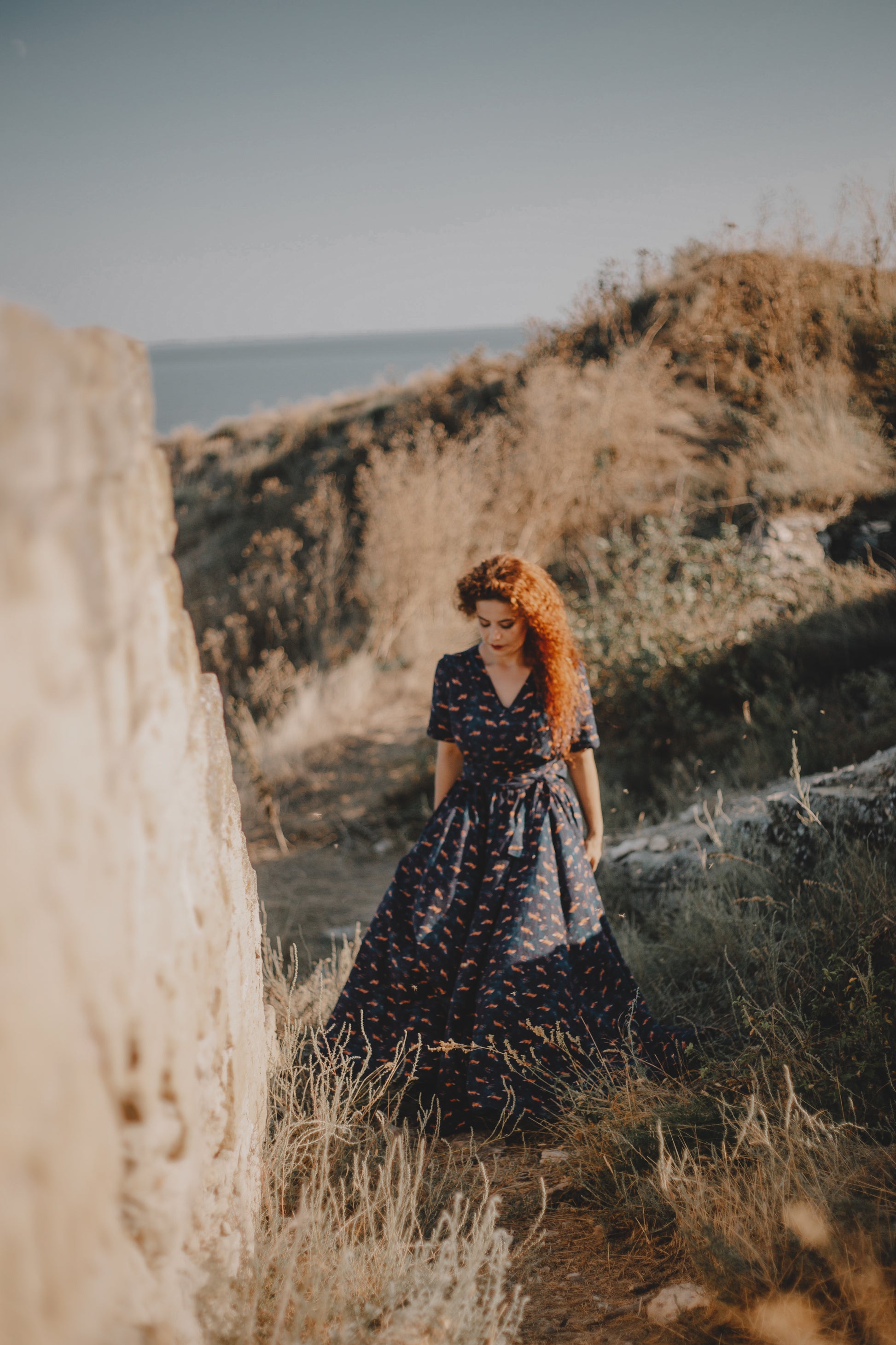 Woman in modest nursing dress outdoors