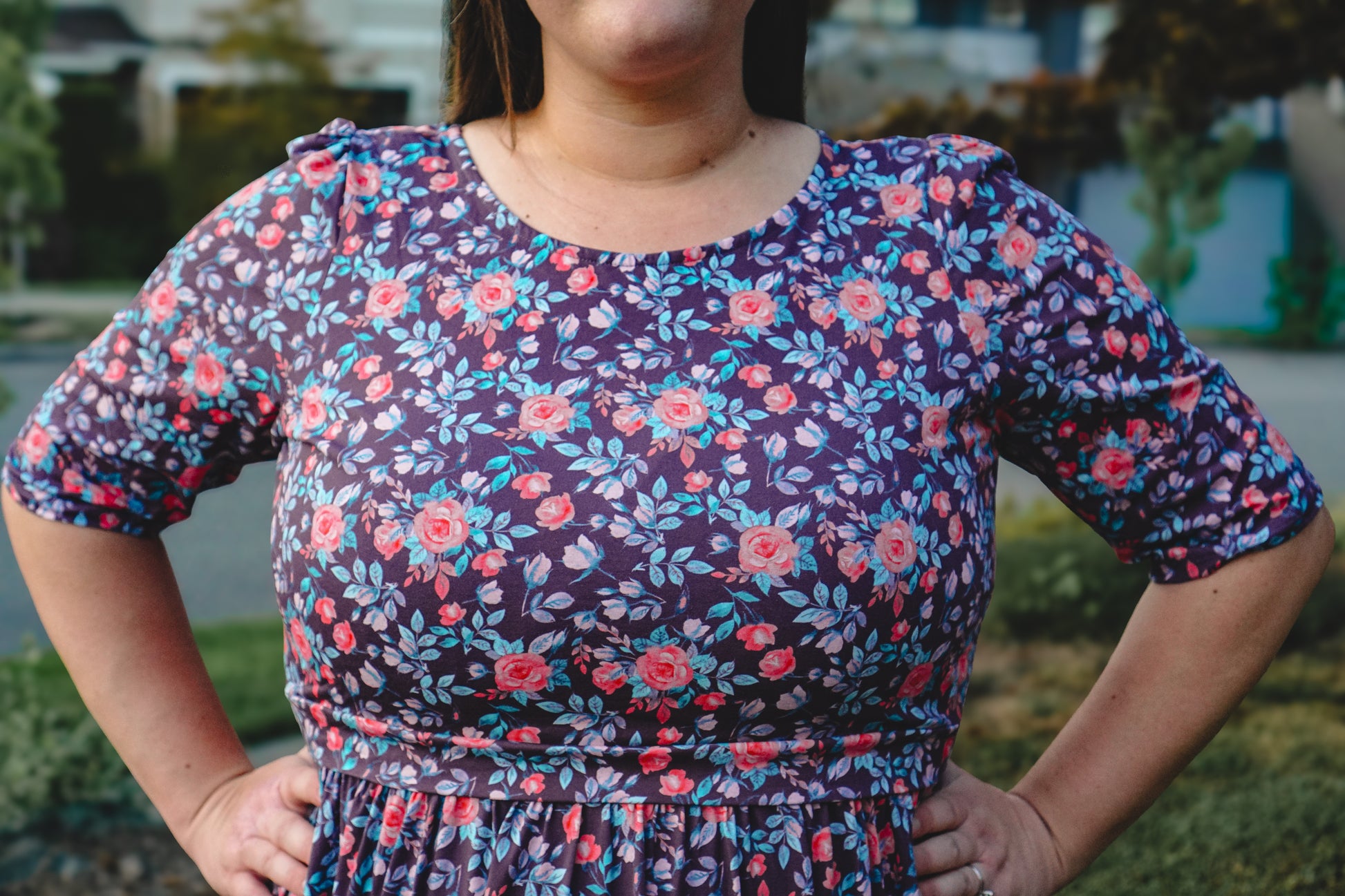 woman wearing a modest nursing floral dress
