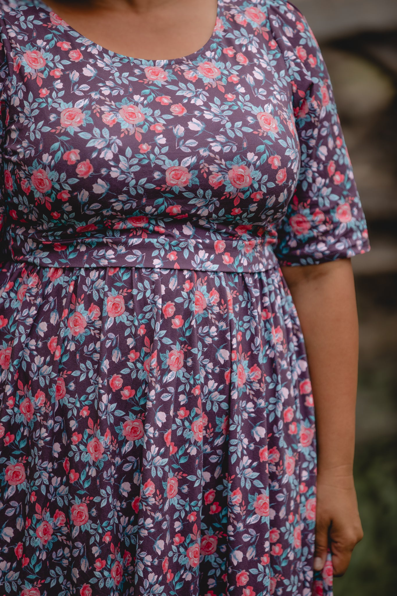woman wearing a modest nursing floral dress